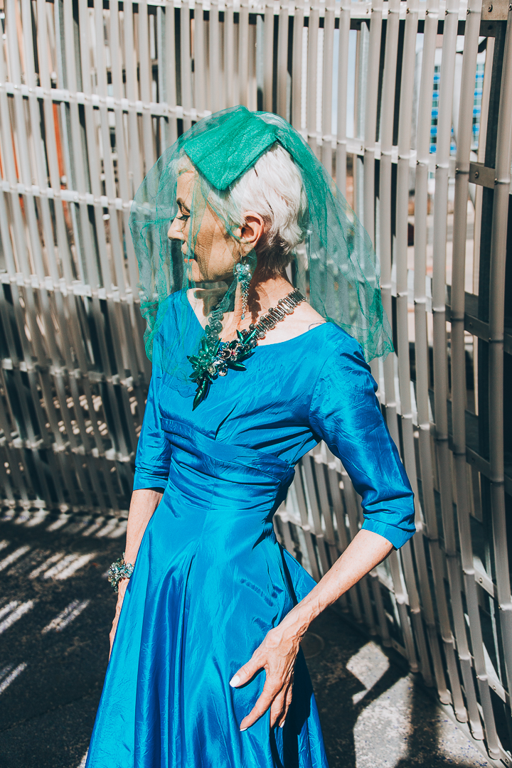 Advanced style blogger Style Crone wearing gemstone and silver earrings