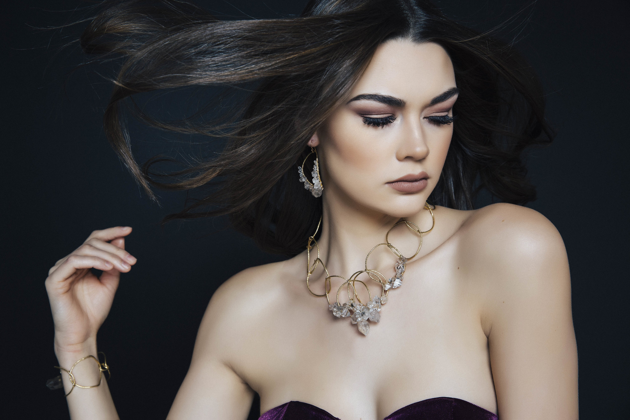 Model wearing a statement herkimer diamond and crystal collar