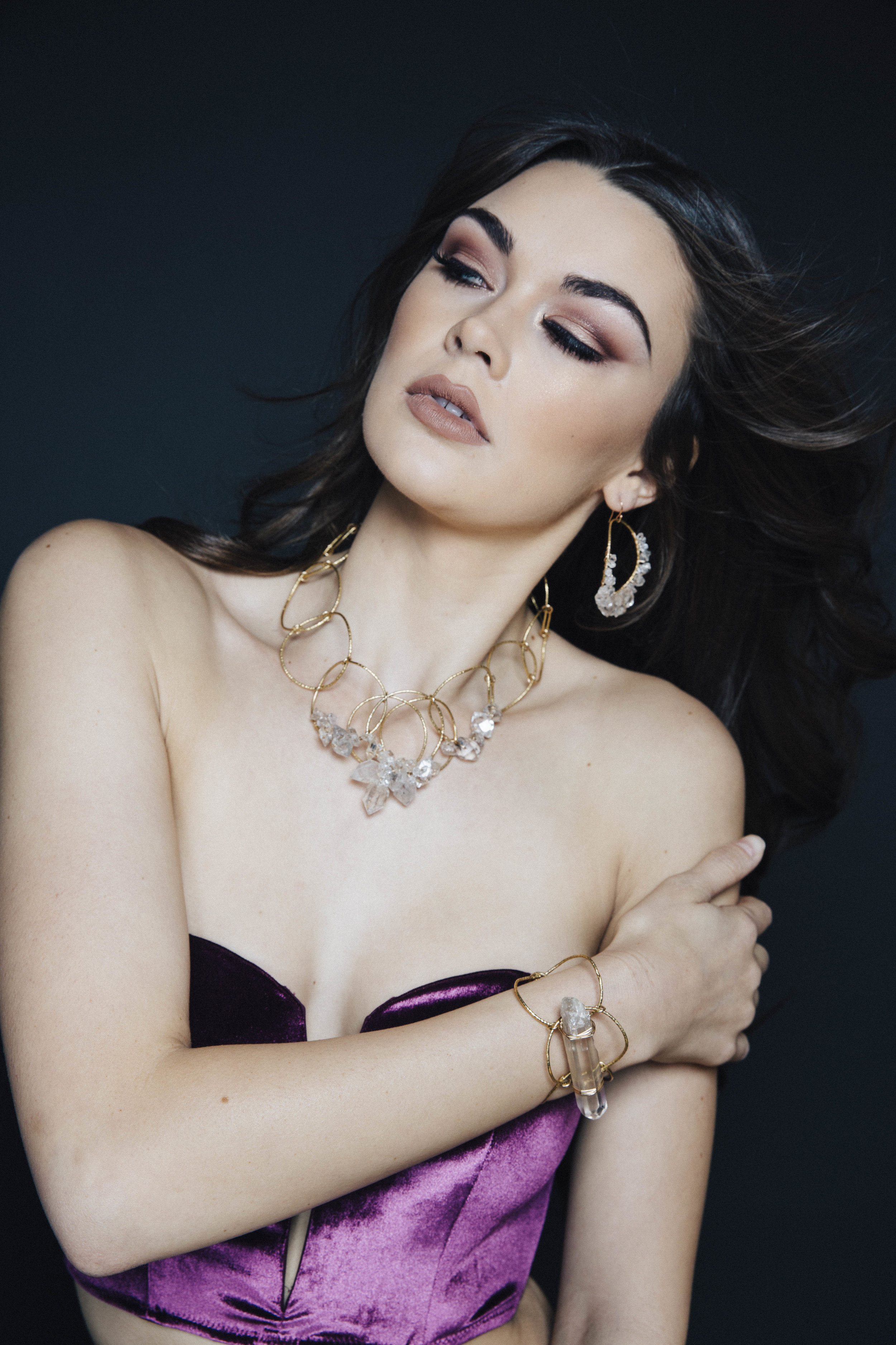 Model wearing a statement herkimer diamond and crystal collar