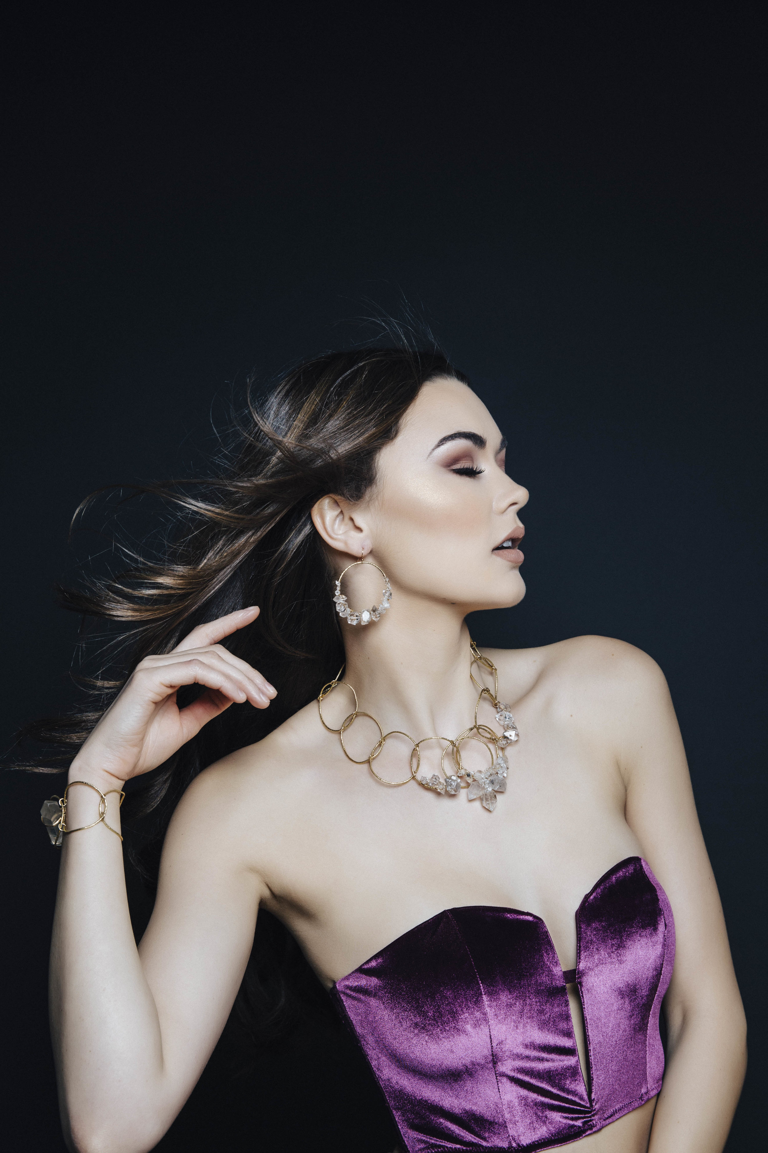 Model wearing a statement herkimer diamond and crystal collar