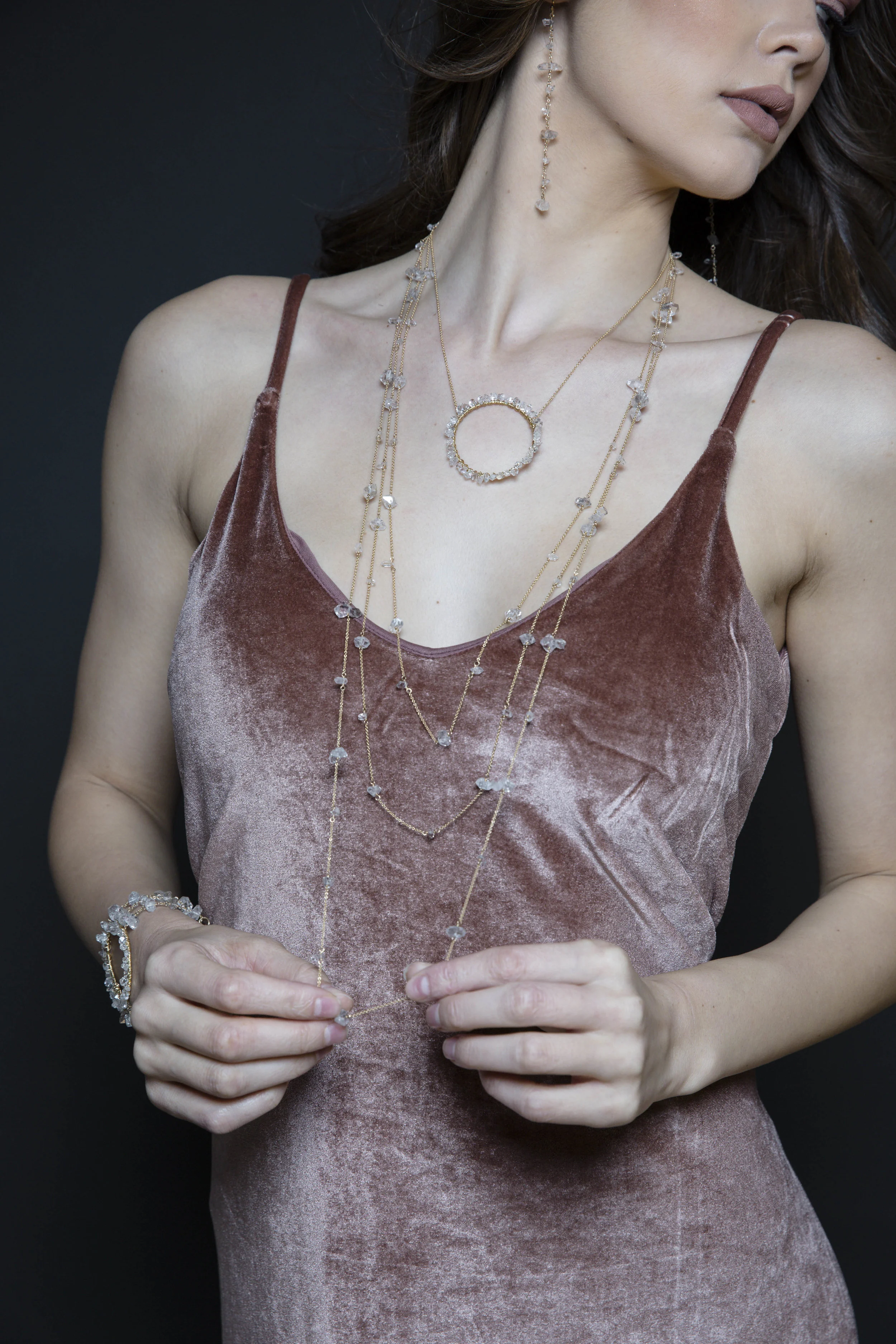 Model wearing herkimer diamond layering necklaces