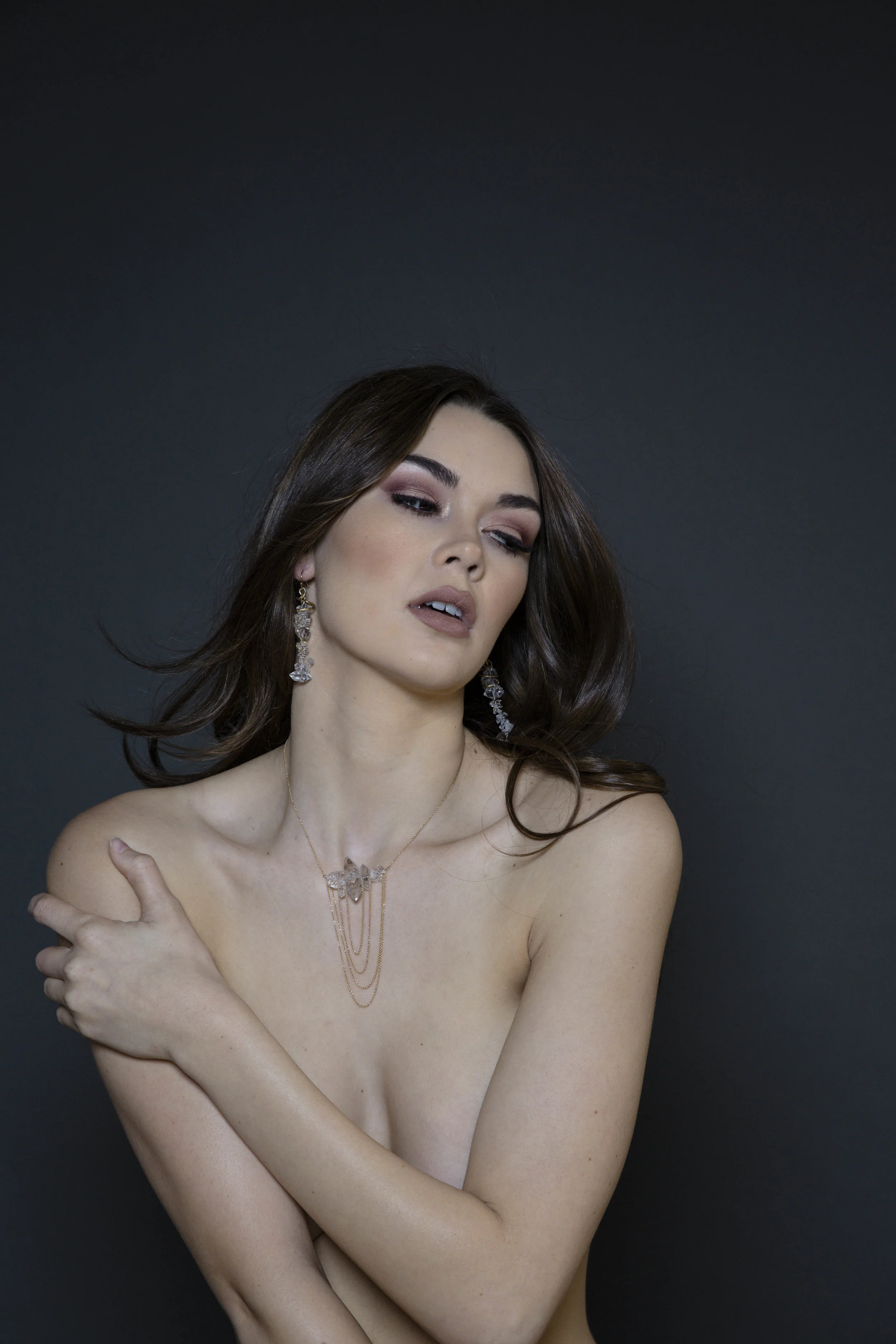 model wearing herkimer diamond earrings
