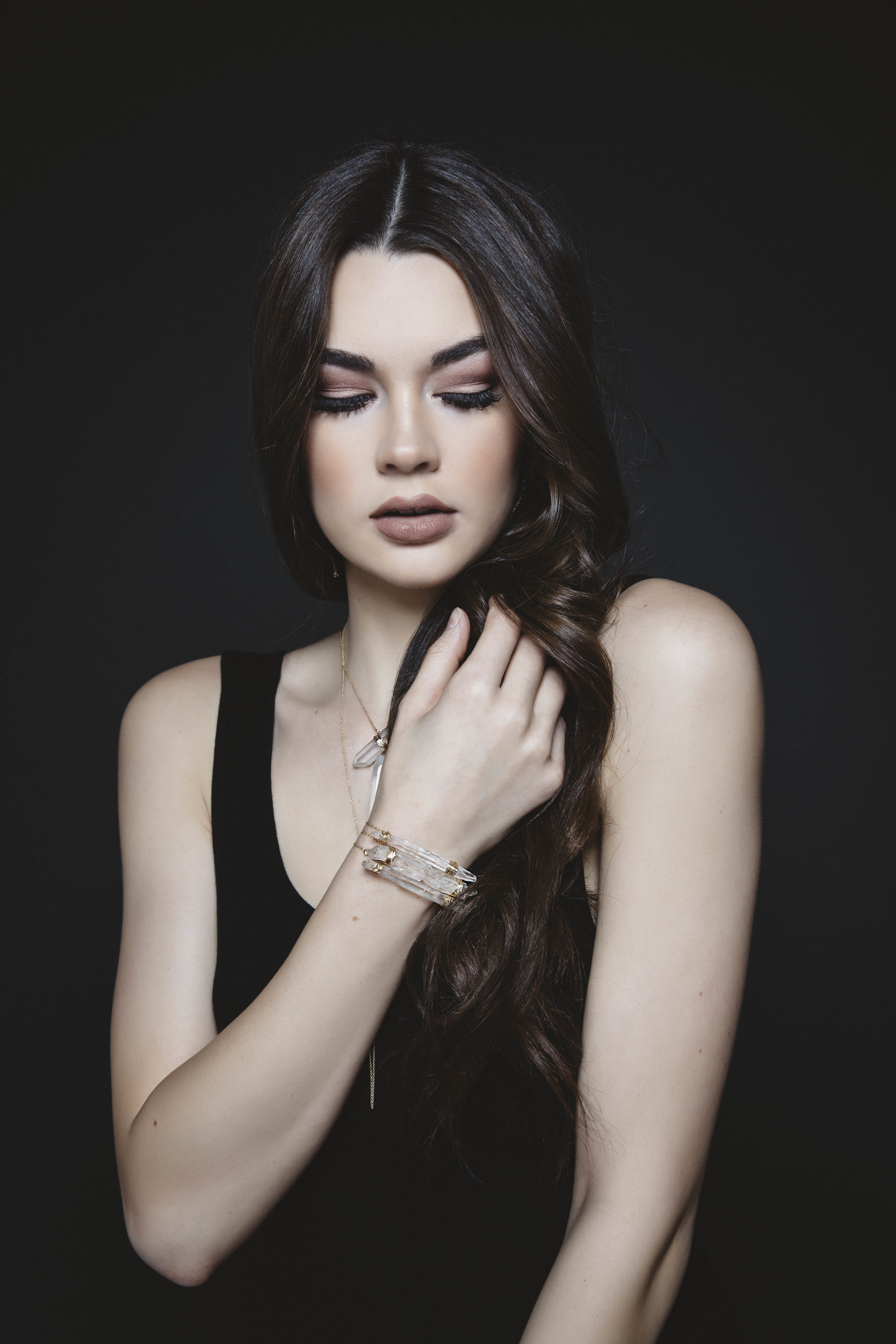 model wearing a crystal point wrap bracelet