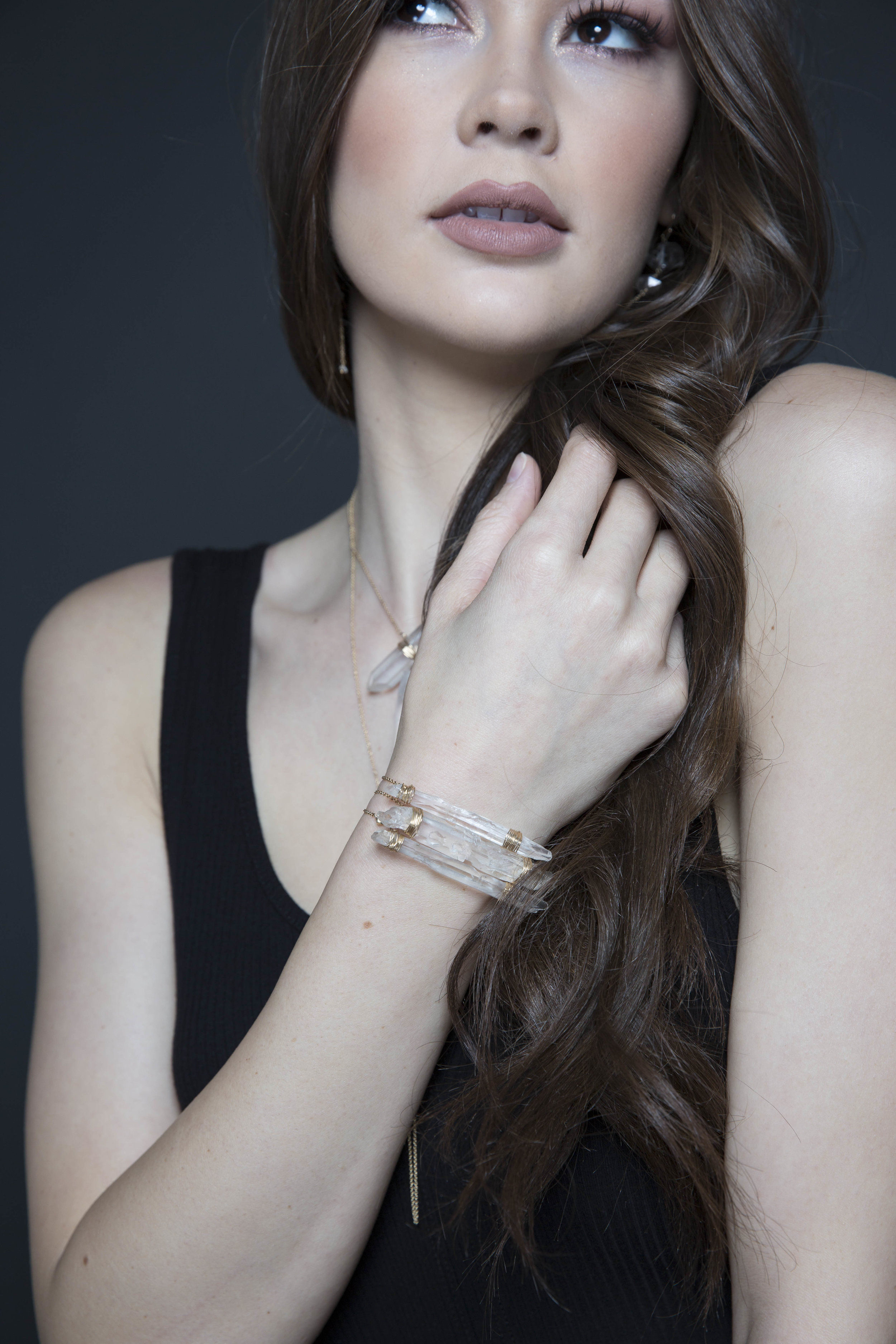 model wearing a crystal point wrap bracelet