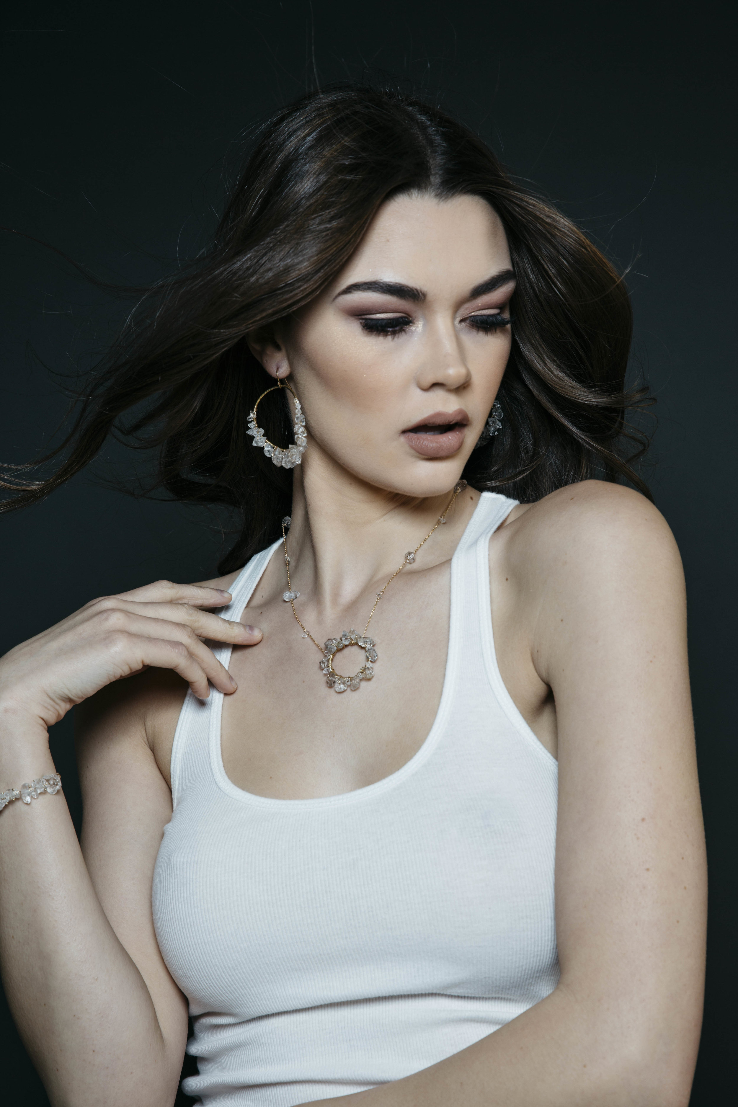 model wearing a herkimer diamond circle encrusted bracelet