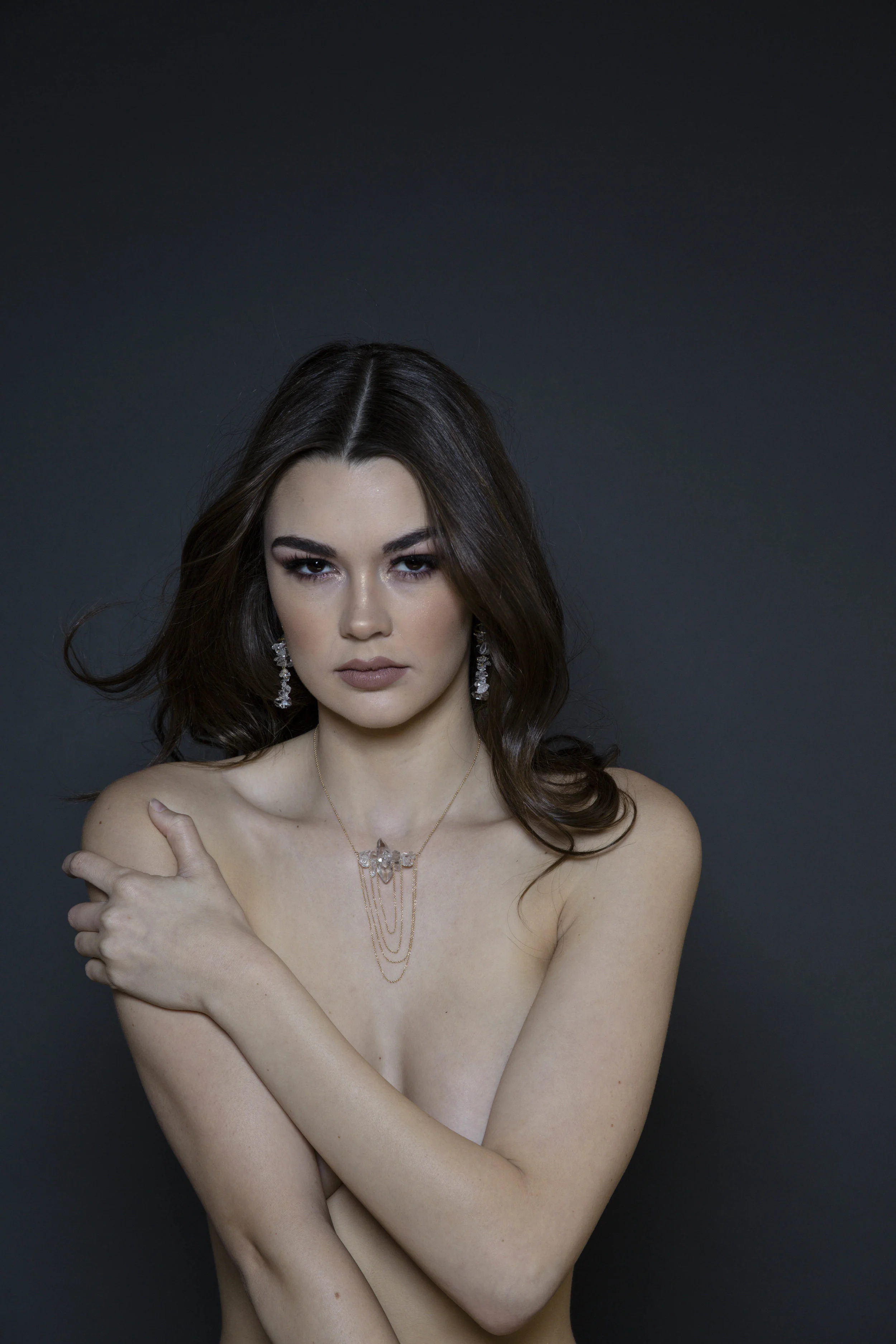 model wearing herkimer diamond cluster earrings