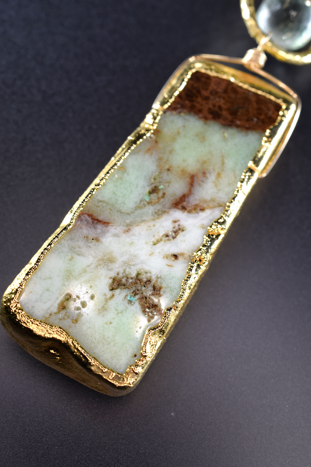 Long gold and gemstone necklace