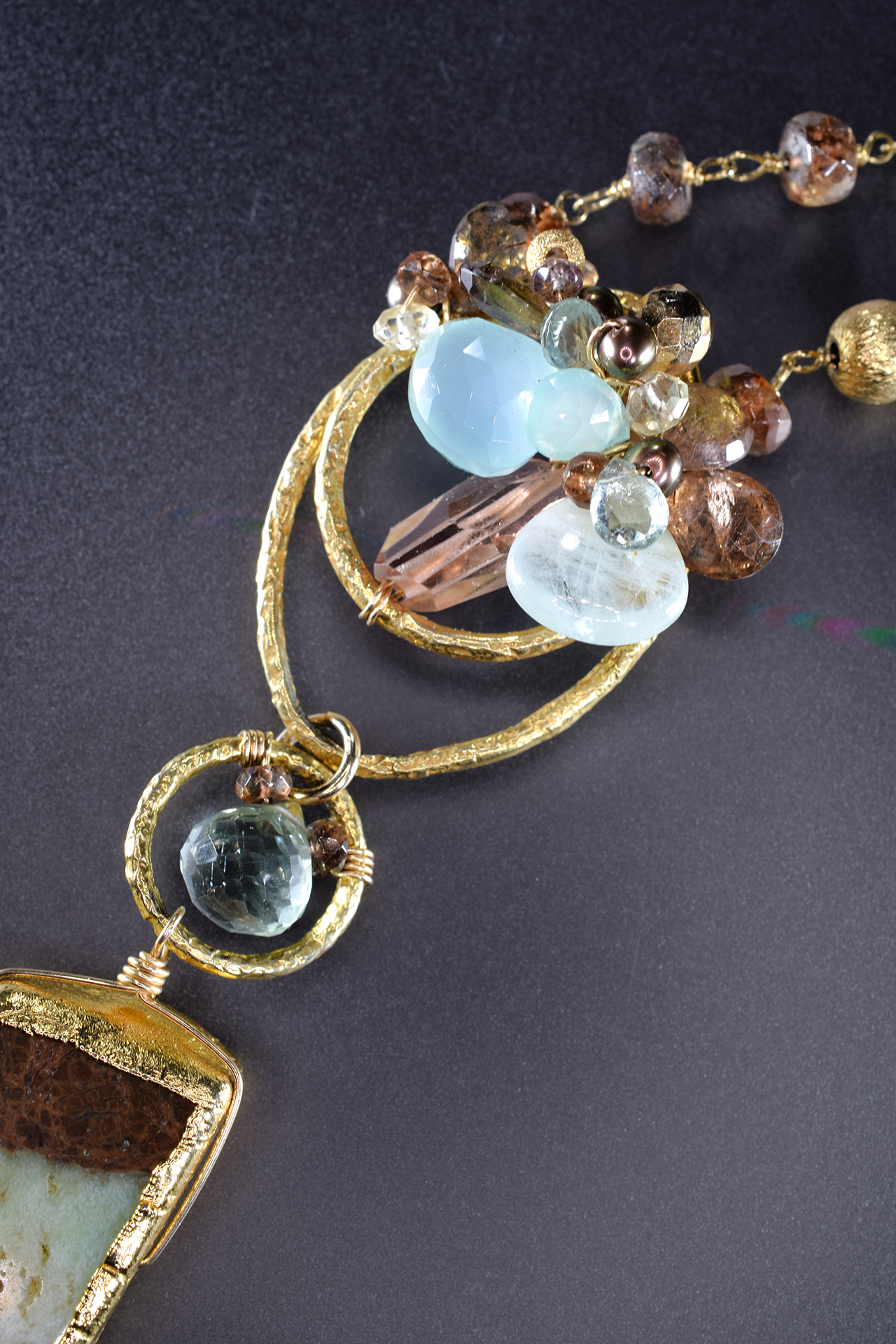Long gold and gemstone necklace