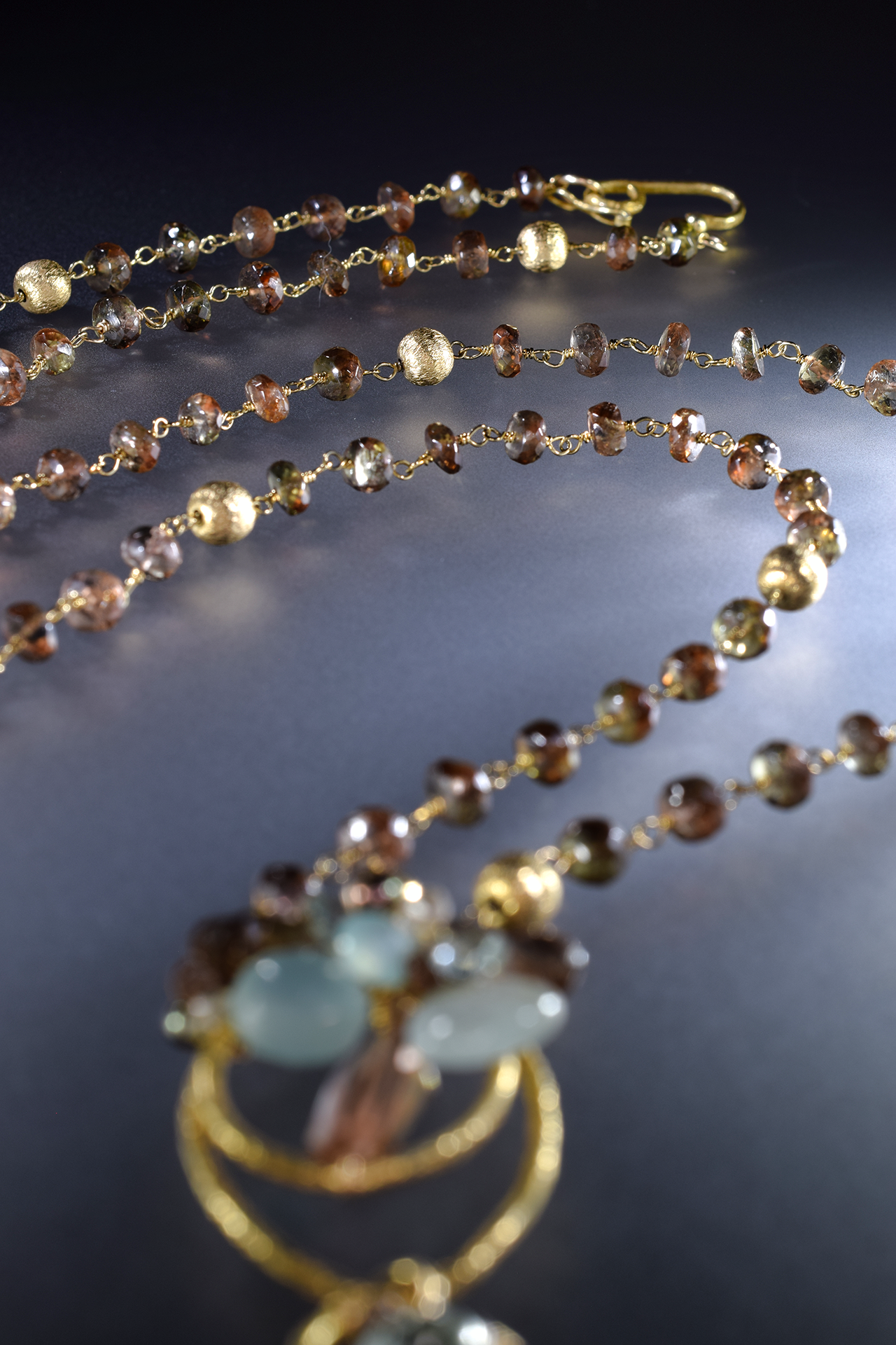 Long gold and gemstone necklace
