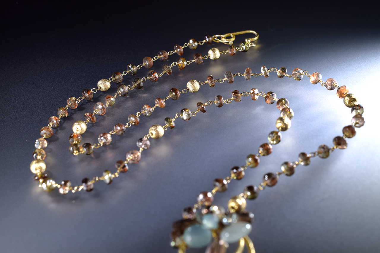 Long gold and gemstone necklace