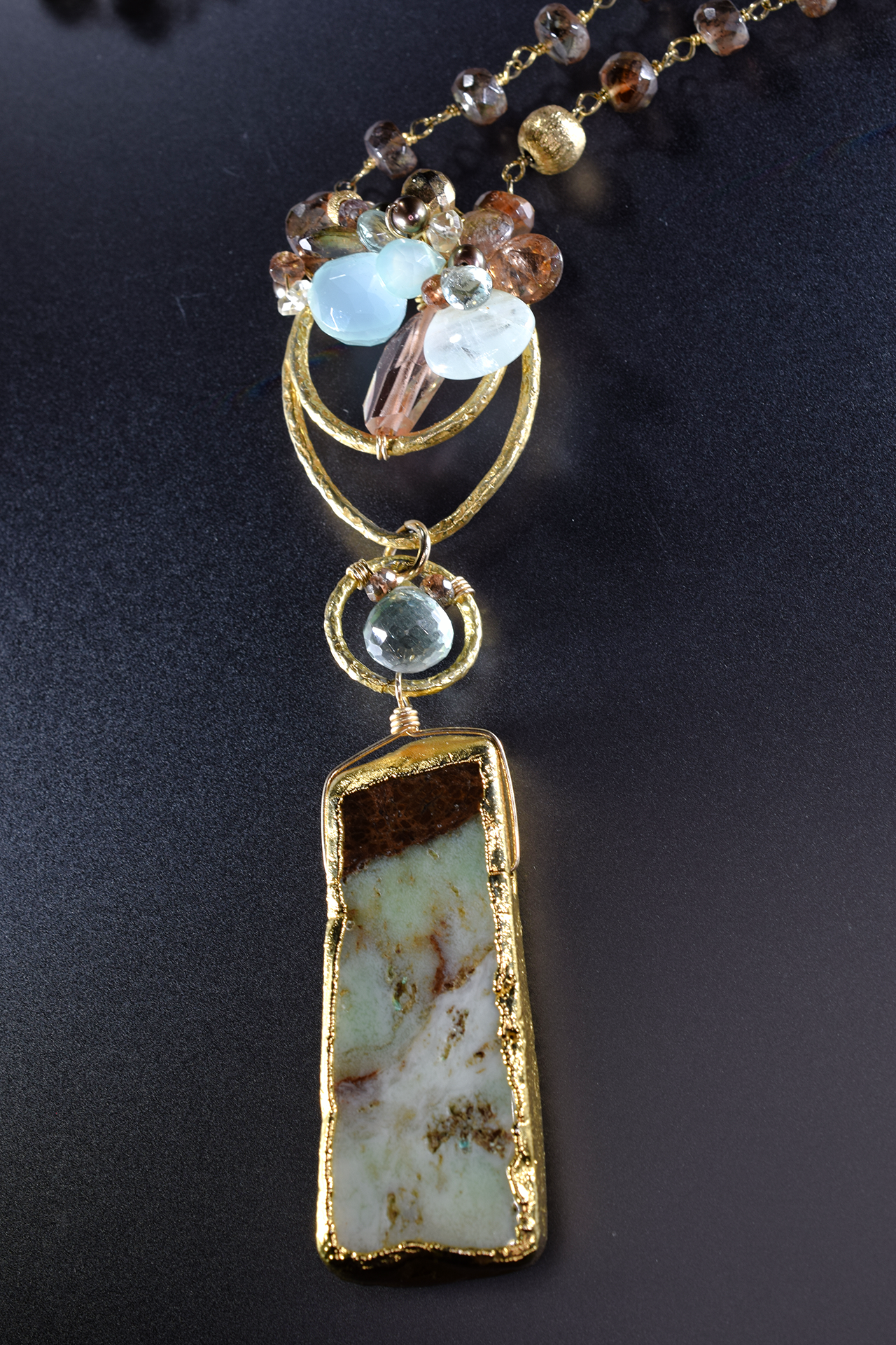Long gold and gemstone necklace