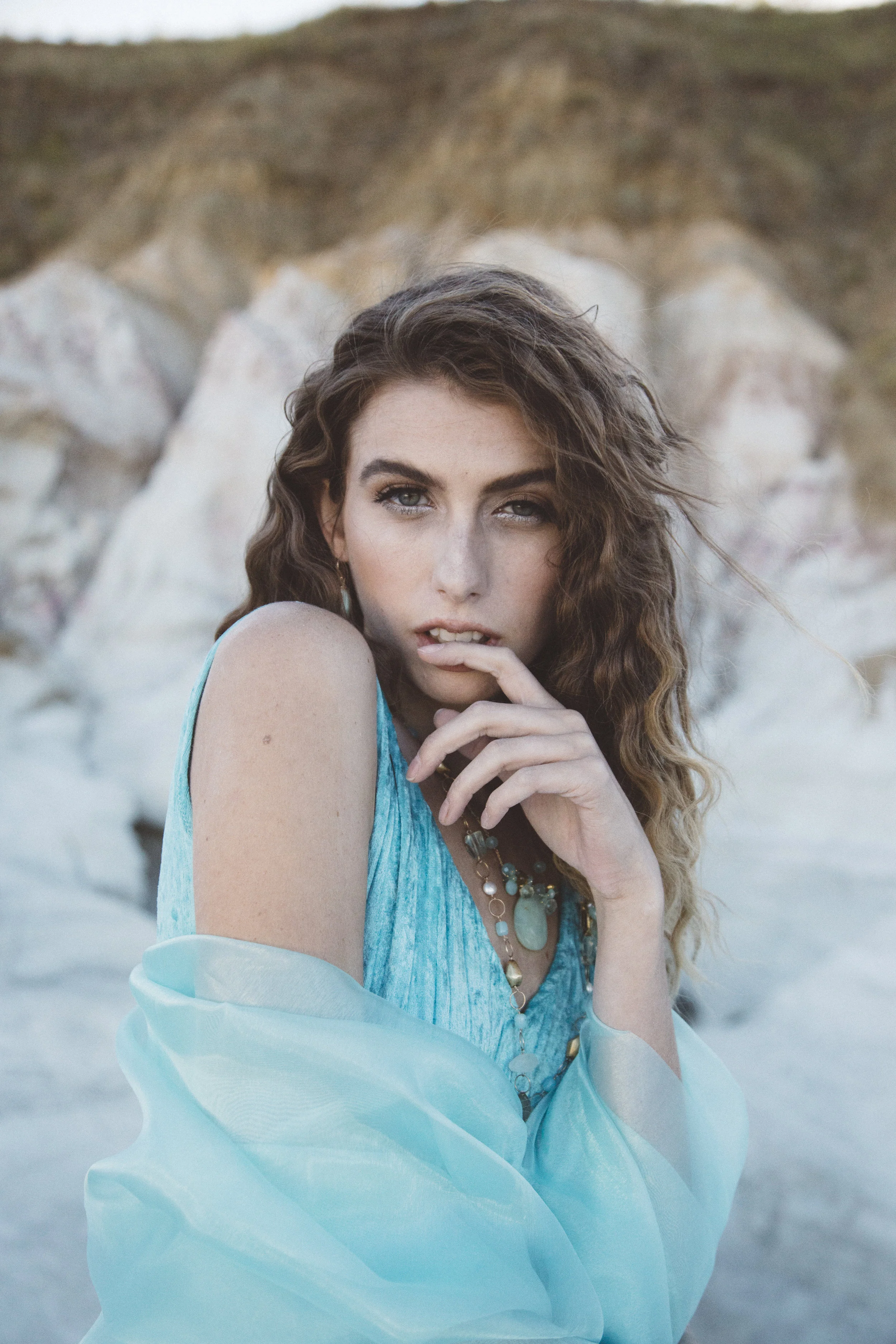 model wearing peruvian opal and gemstone necklace