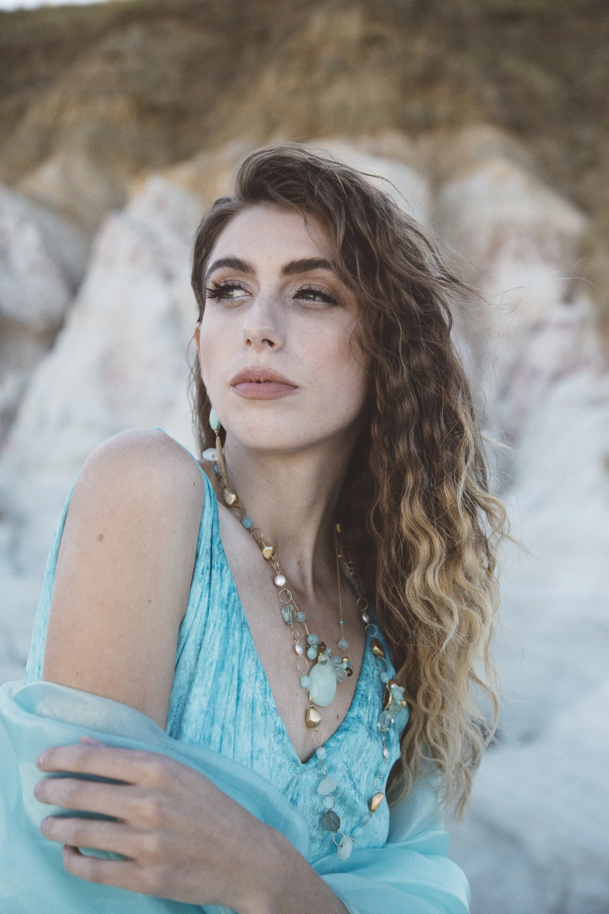 model wearing peruvian opal and gemstone necklace