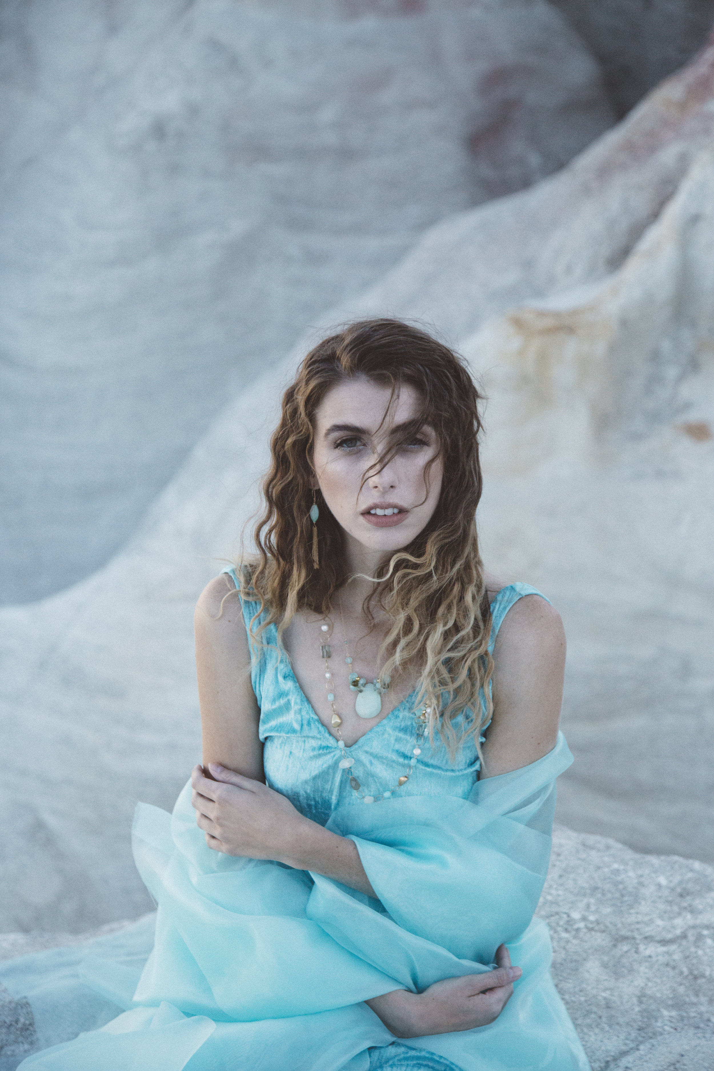 model wearing peruvian opal and gemstone necklace