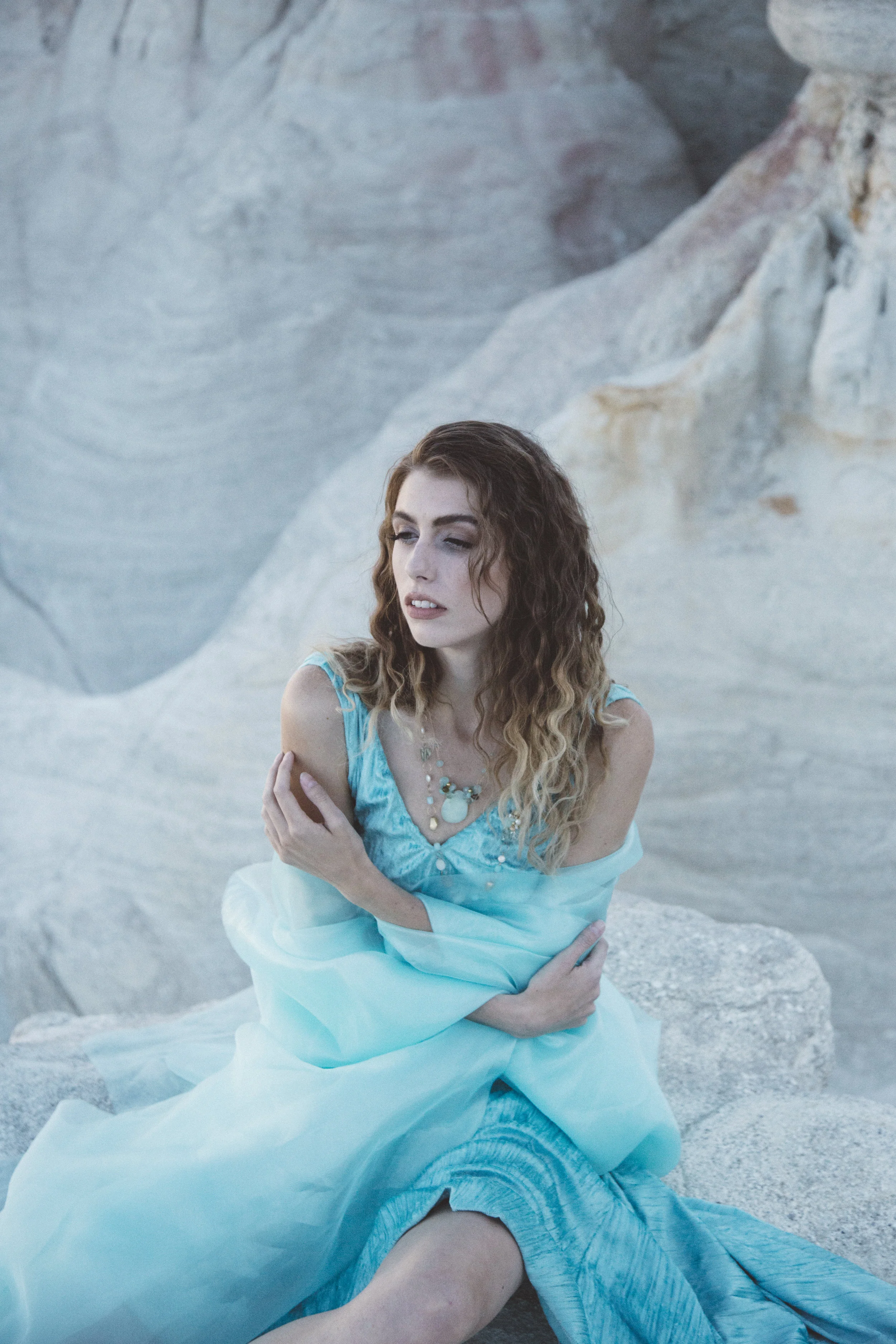 model wearing peruvian opal and gemstone necklace