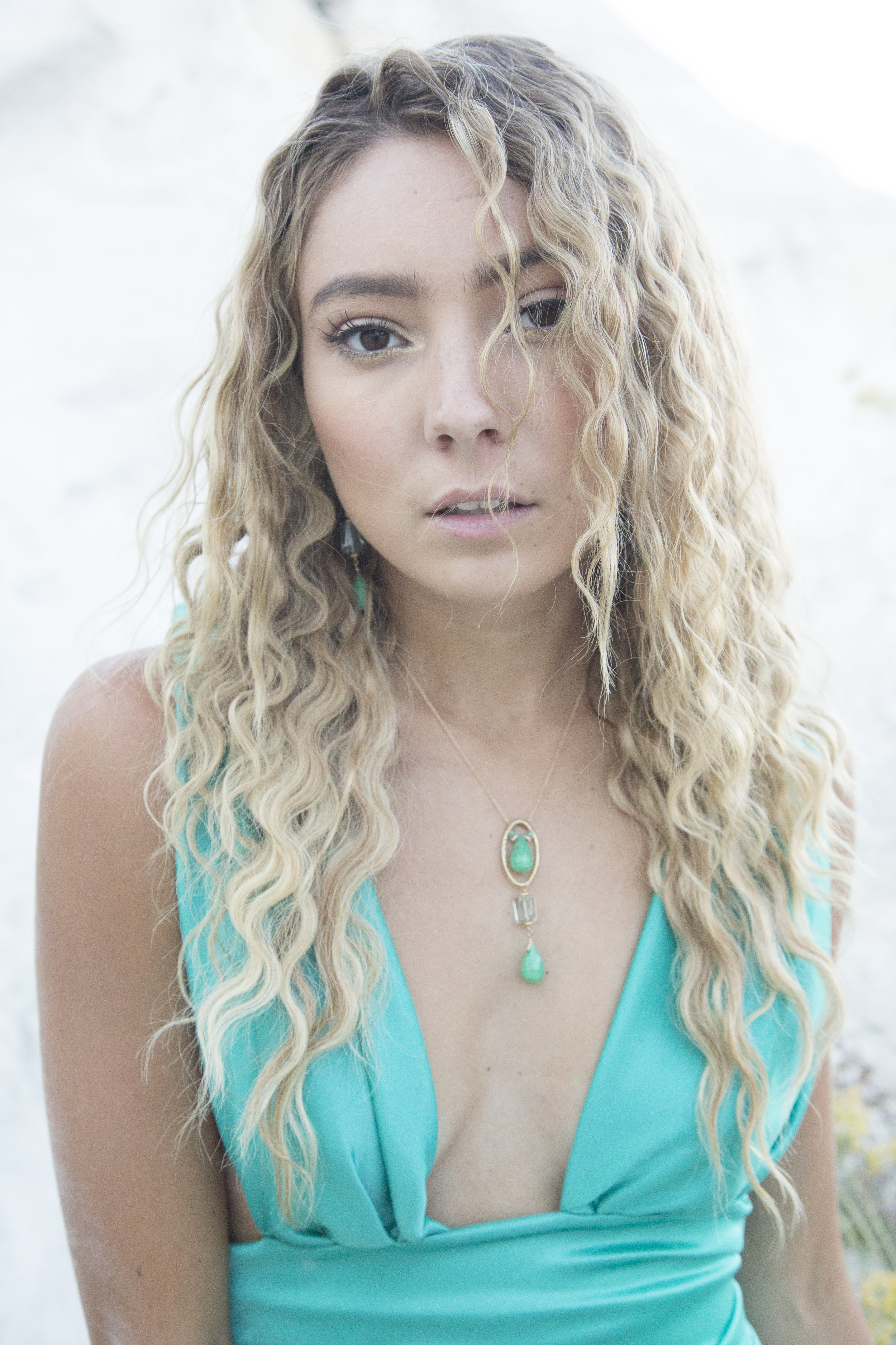 model wearing chrysoprase and green amethyst drop pendant necklace 