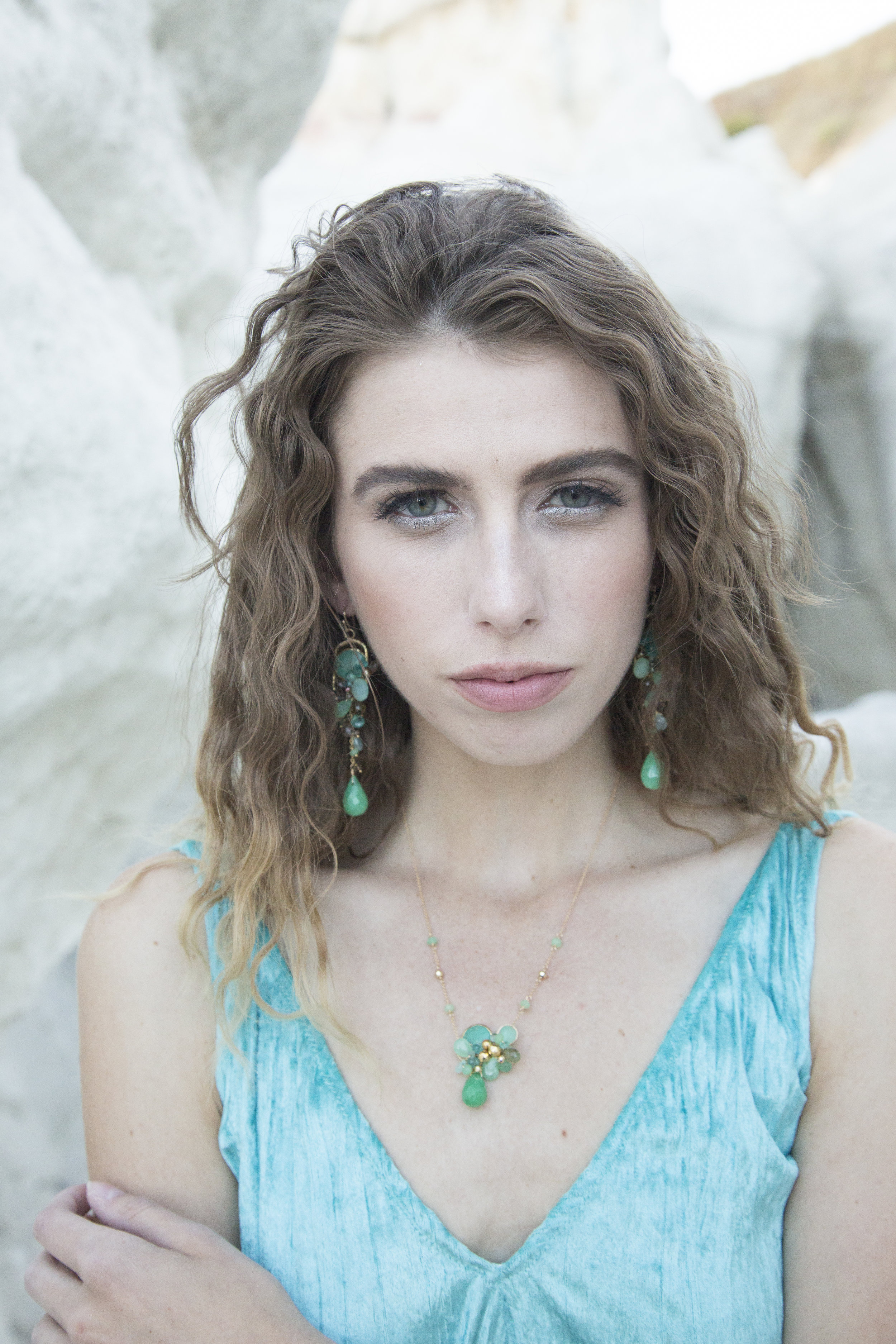 model wearing a chrysoprase and gemstone necklace 