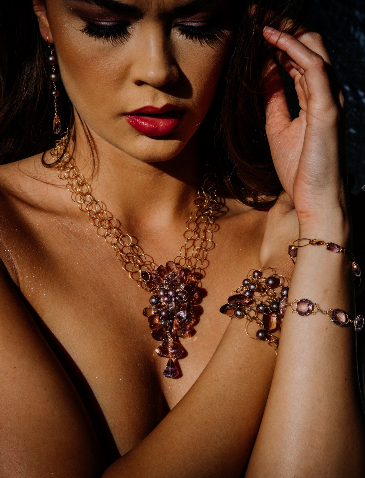 model wearing amethyst, ametrine and pearl statement necklace