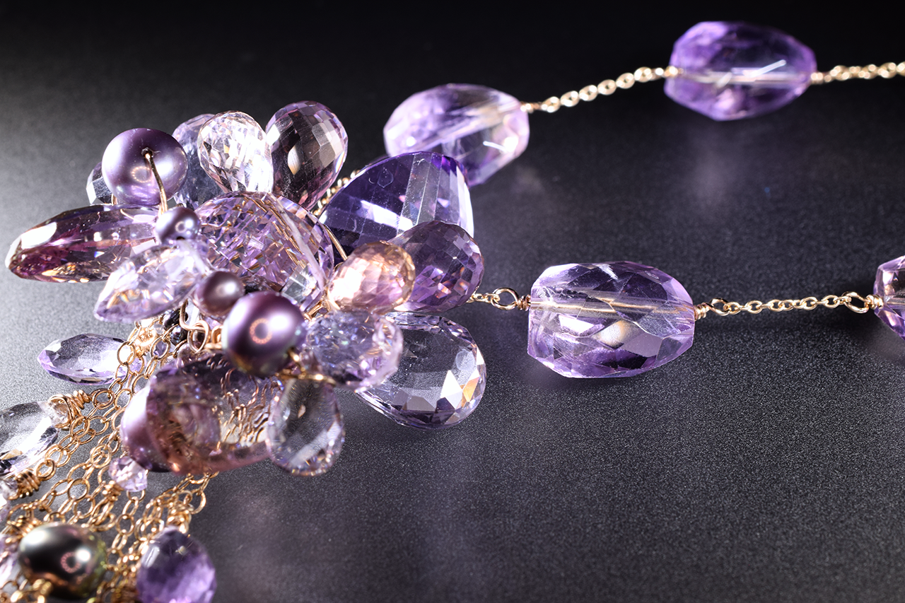 details of a pink amethyst ametrine and pearl multi drop pendant necklace