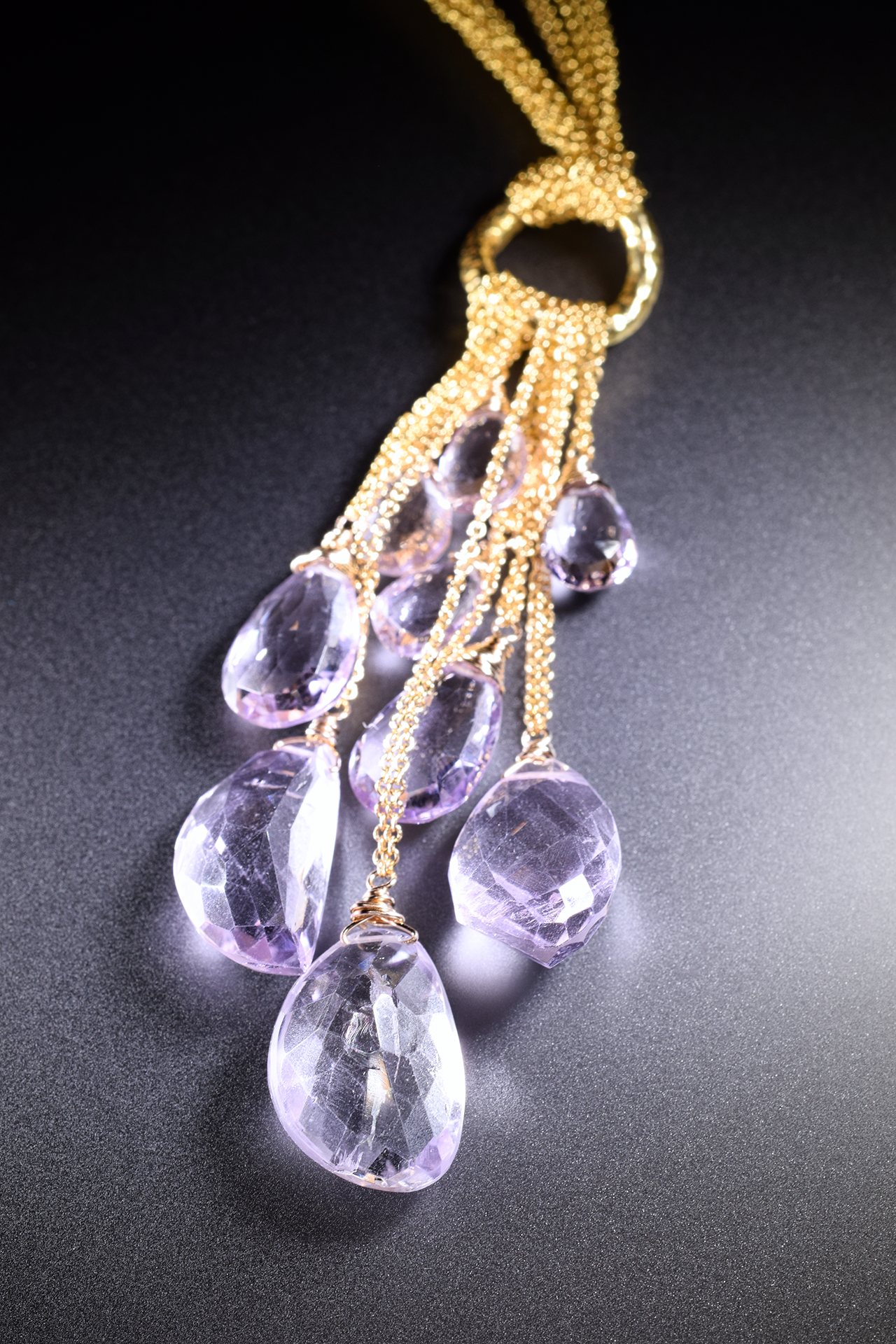 details of a pink amethyst multi drop gold chain necklace