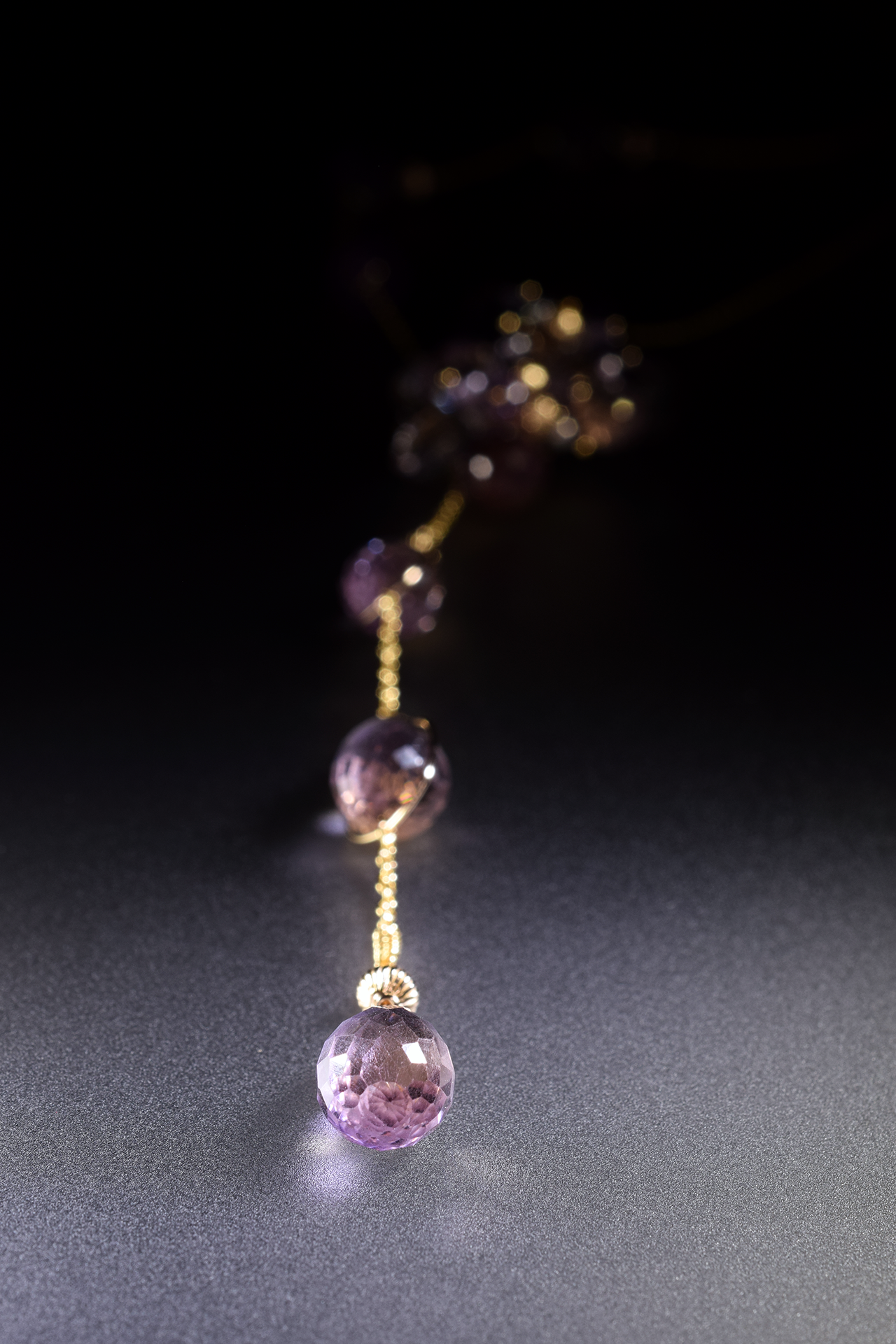 details of ametrine and pink amethyst lariat necklace