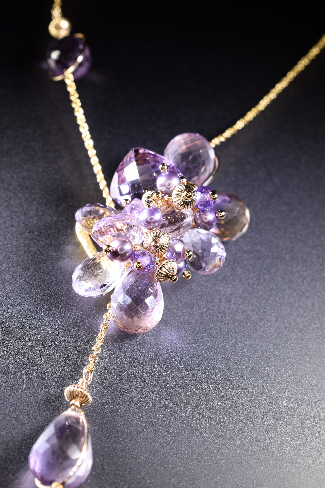 details of ametrine and pink amethyst lariat necklace