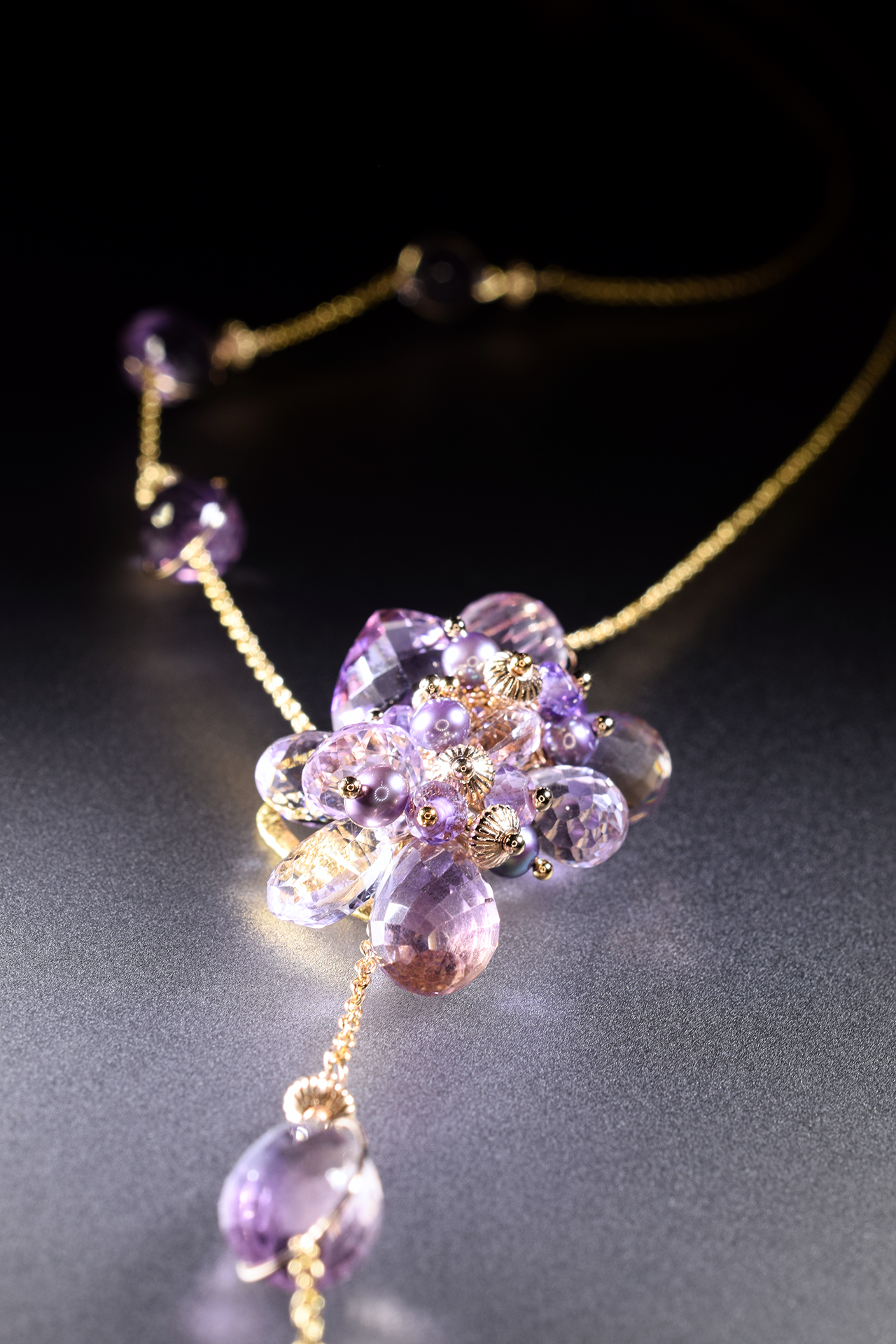 details of ametrine and pink amethyst lariat necklace