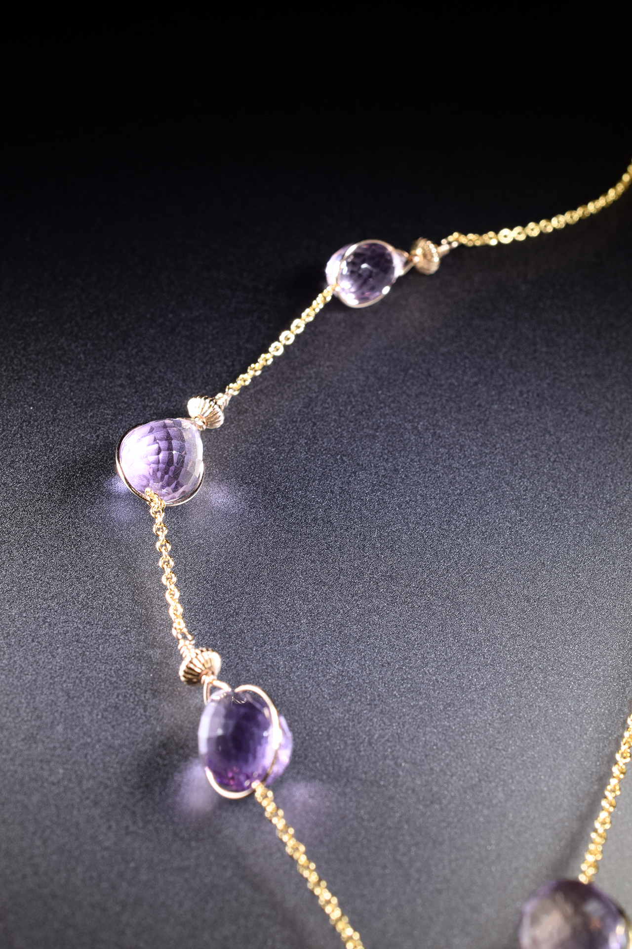 details of ametrine and pink amethyst lariat necklace