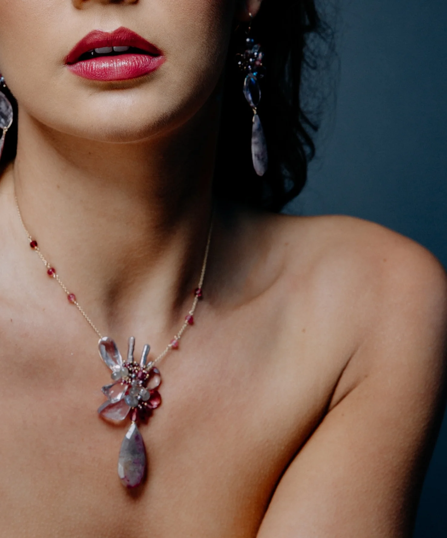 model wearing a pink amethyst pink tourmaline and sapphire drop pendant necklace