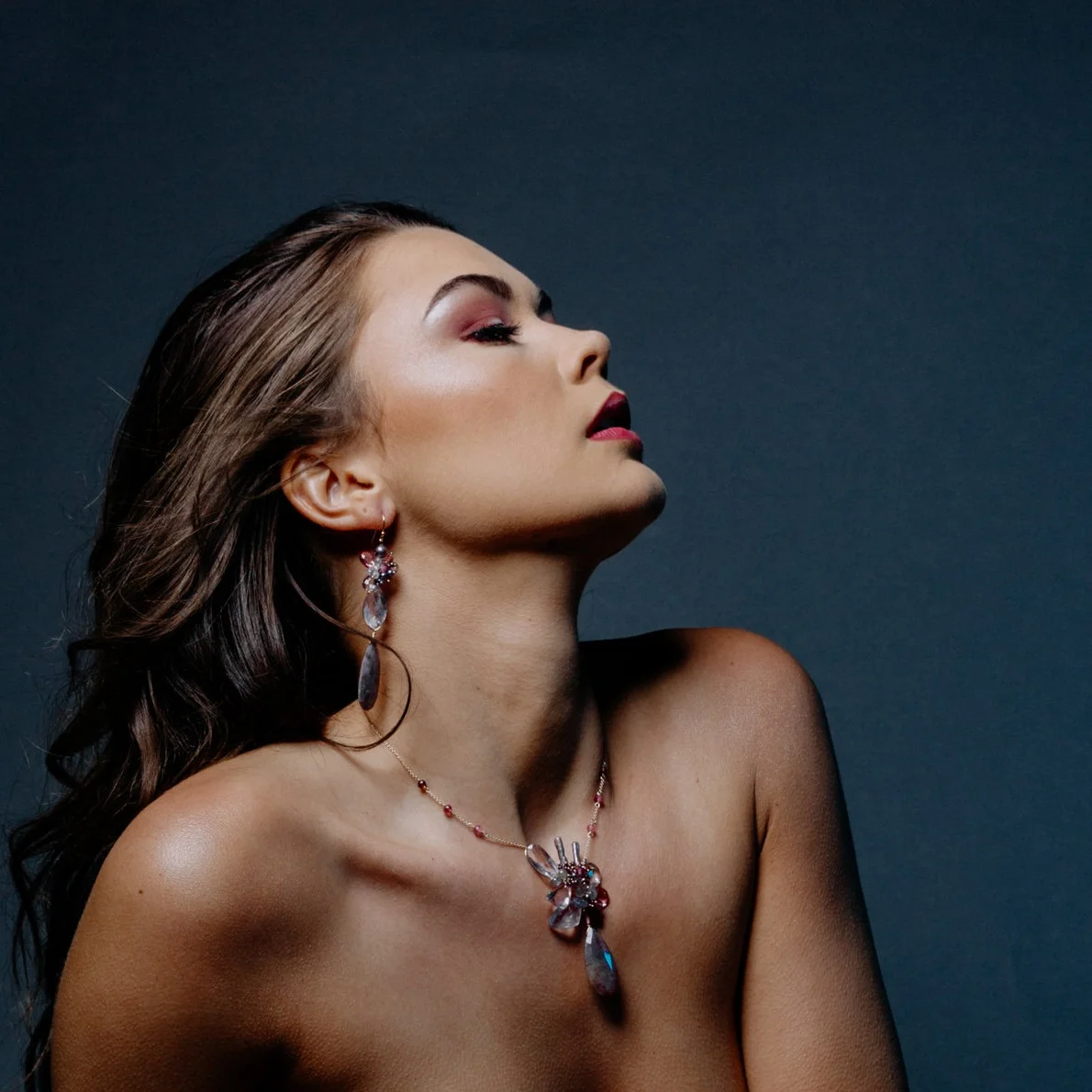 model wearing a pink amethyst pink tourmaline and sapphire drop pendant necklace