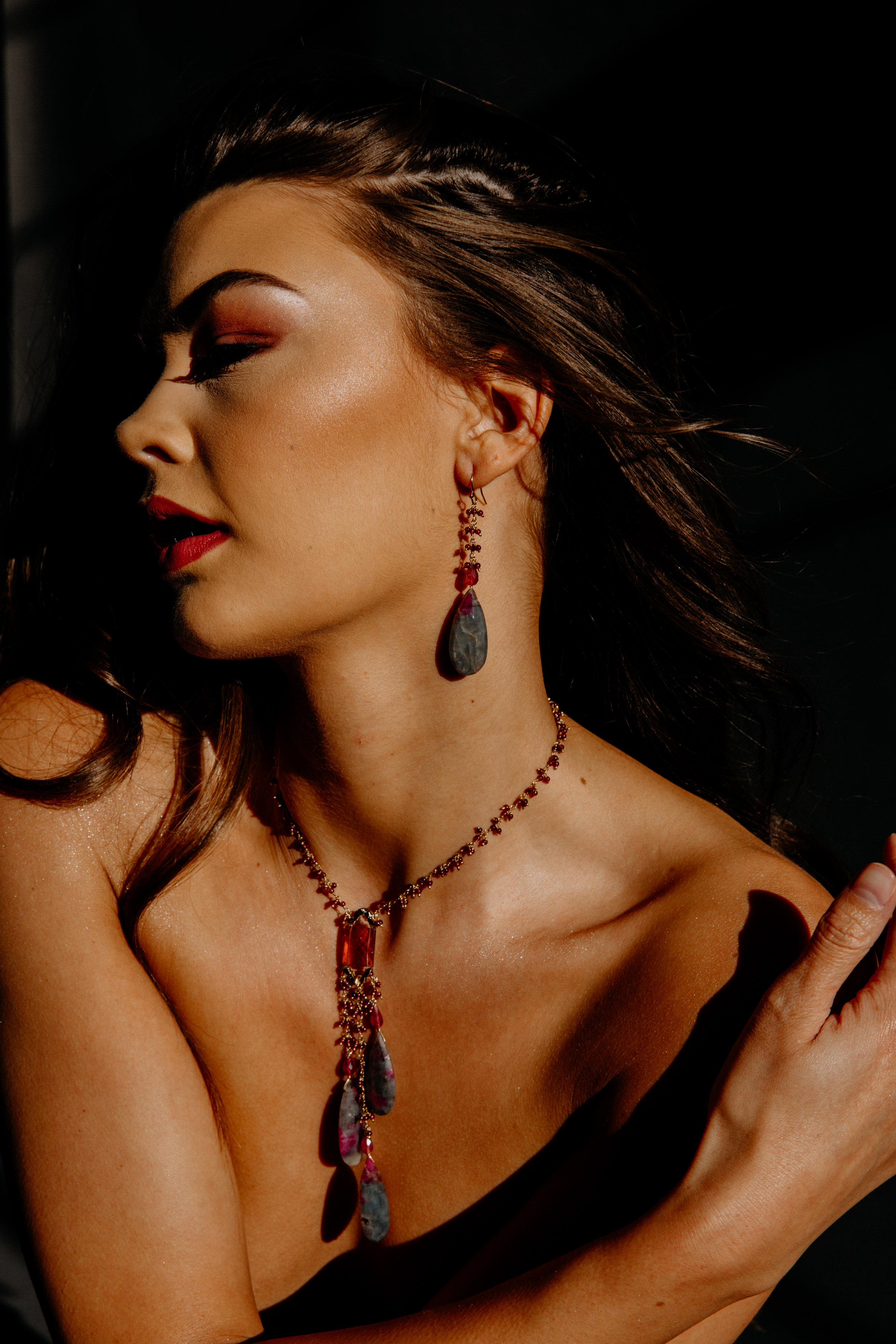 model wearing long multi drop sapphire necklace