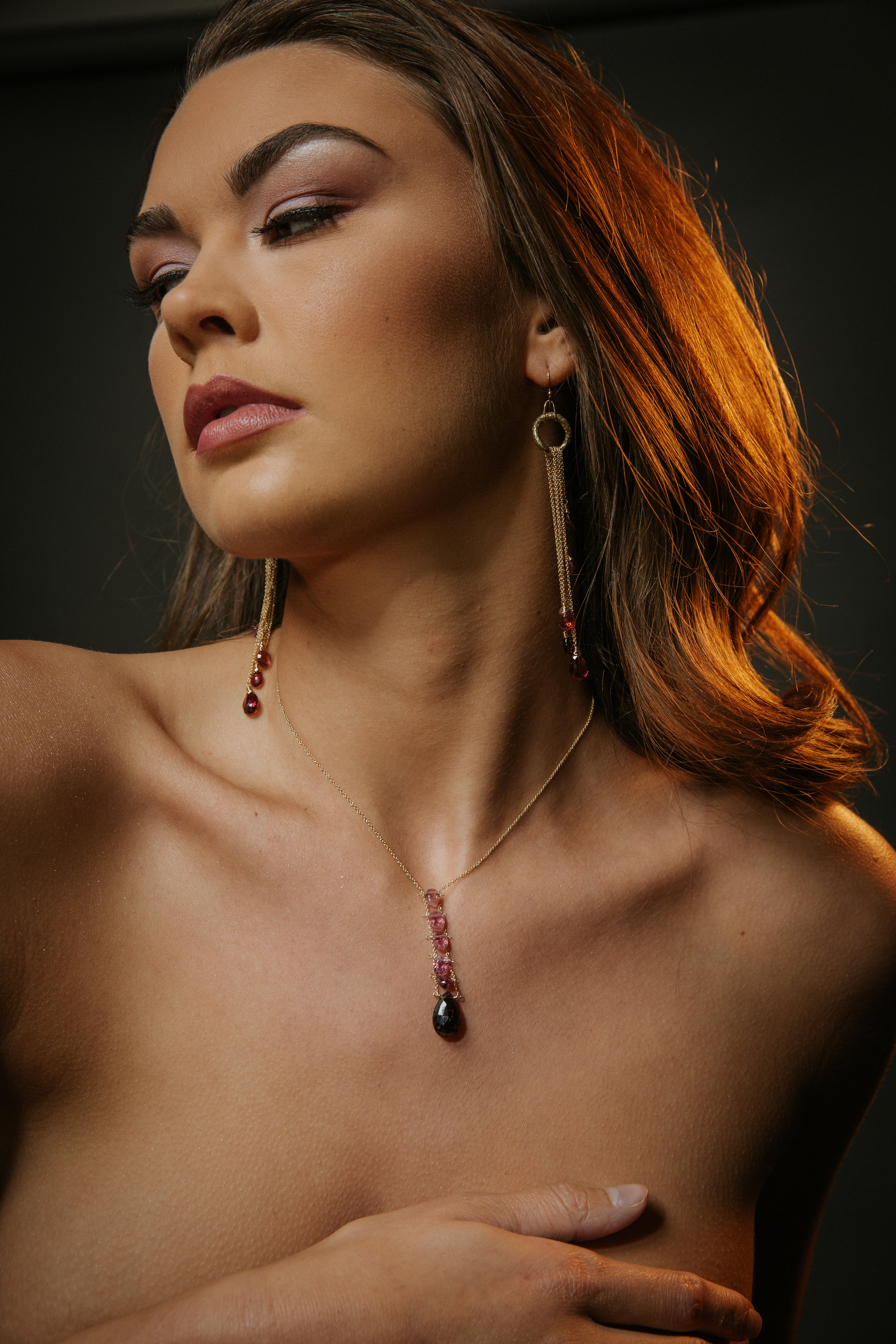 model wearing pink tourmaline necklace