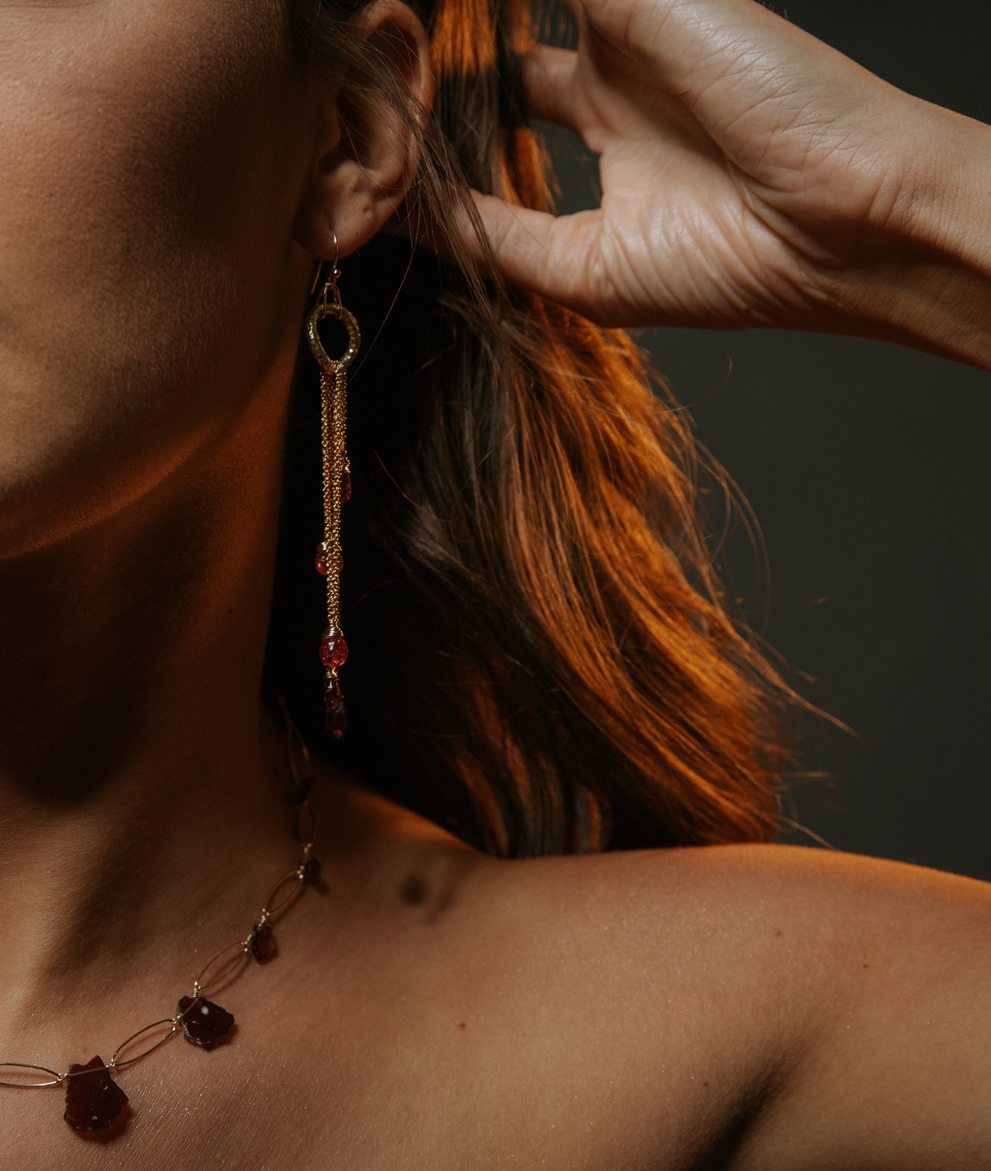 model wearing Pink tourmaline and garnet multi drop earrings