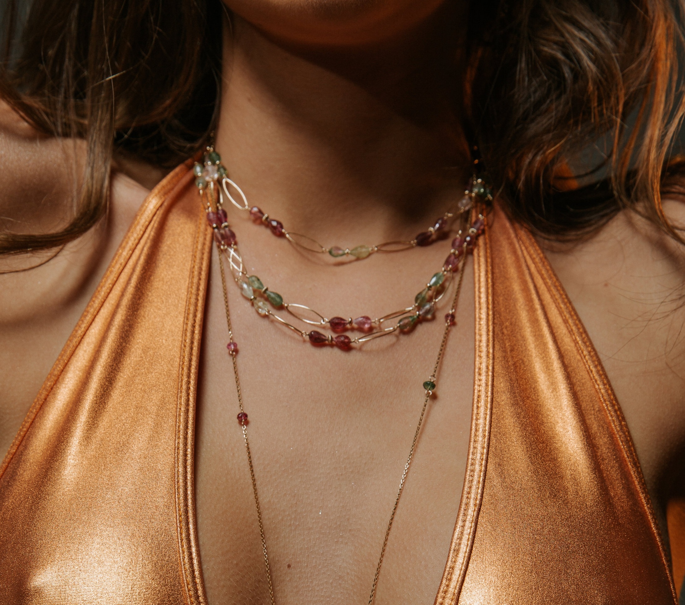 model wearing tourmaline layering necklace