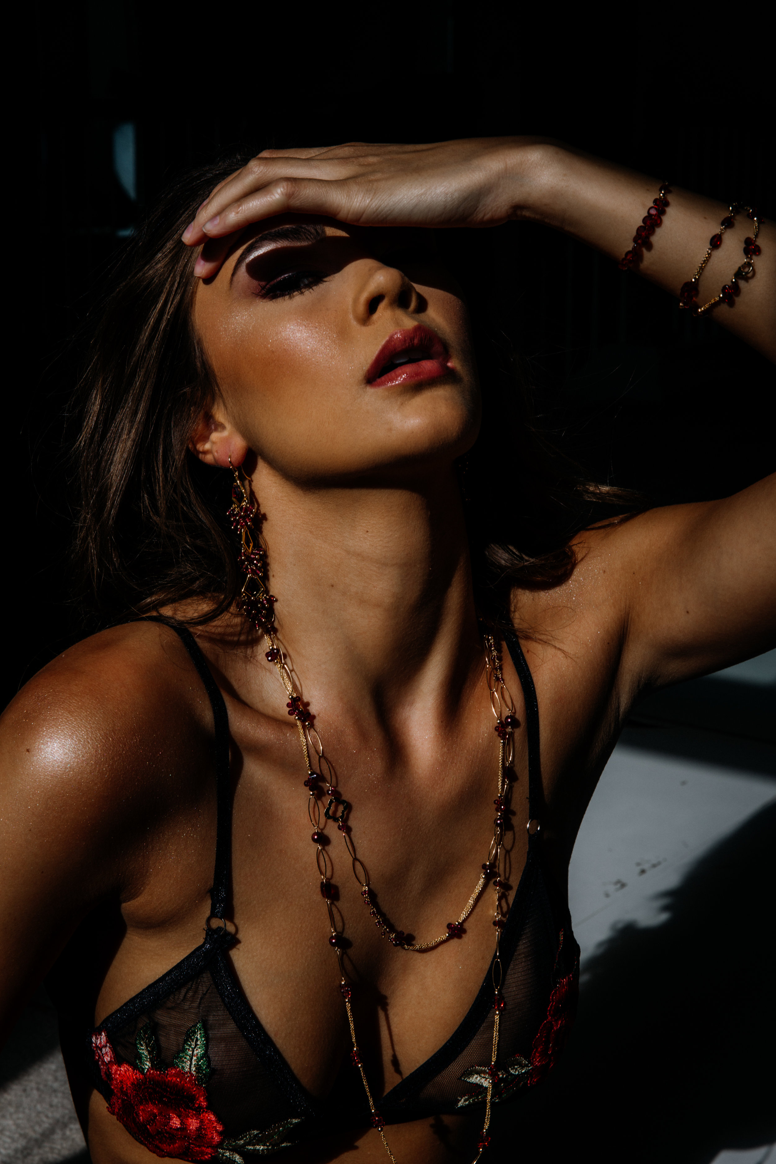 model wearing garnet layering necklace