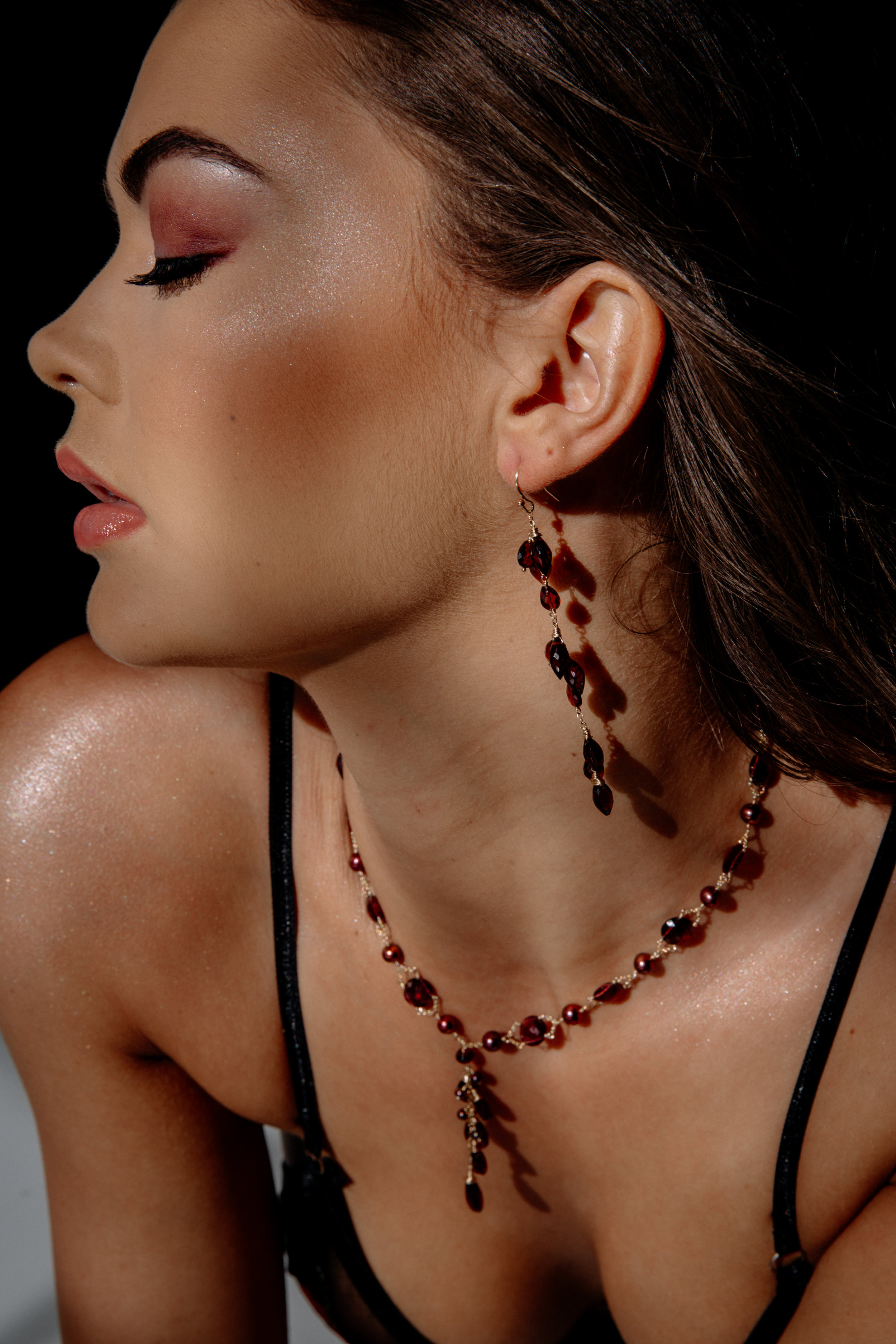 model wearing rhodolite garnet drop earrings 