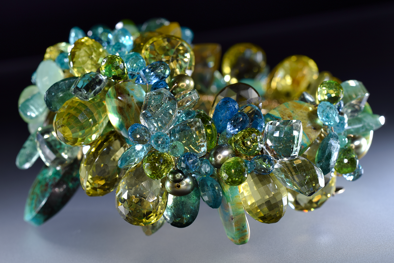 statement green and yellow gemstone and gold cuff bracelet