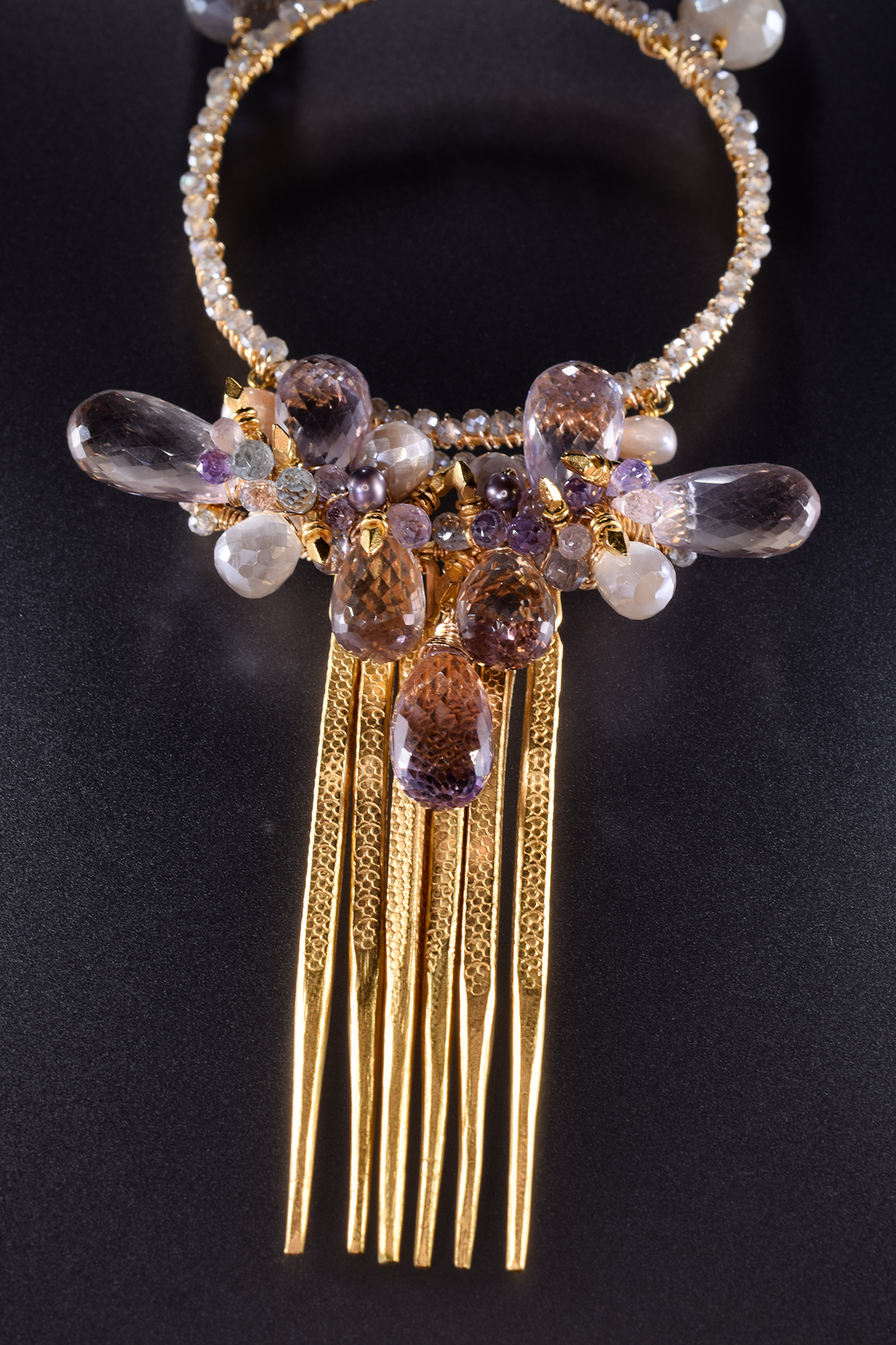 large circle pendant with gemstone drop with gold spike drops long necklace