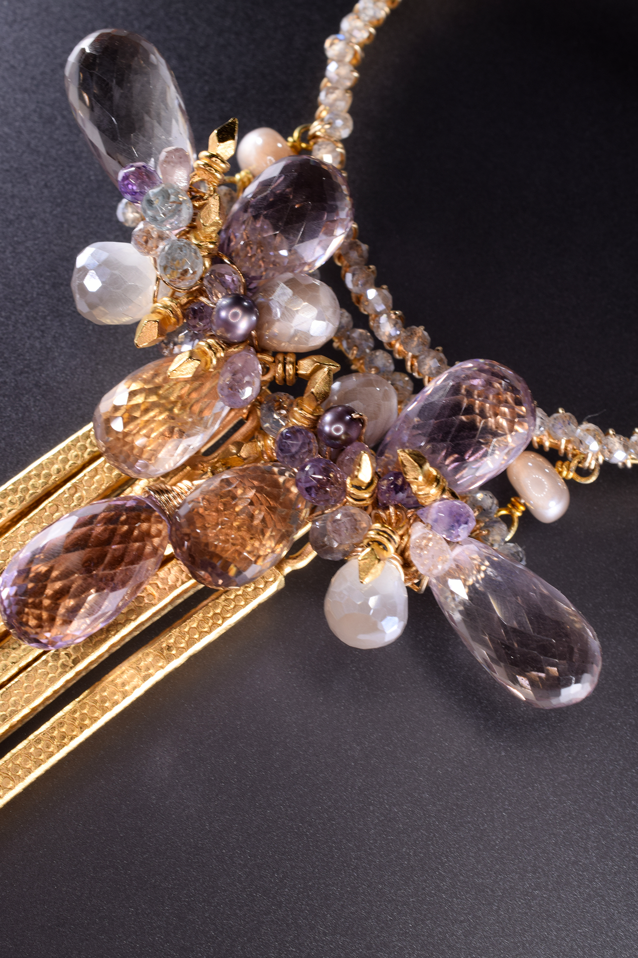 large circle pendant with gemstone drop with gold spike drops long necklace