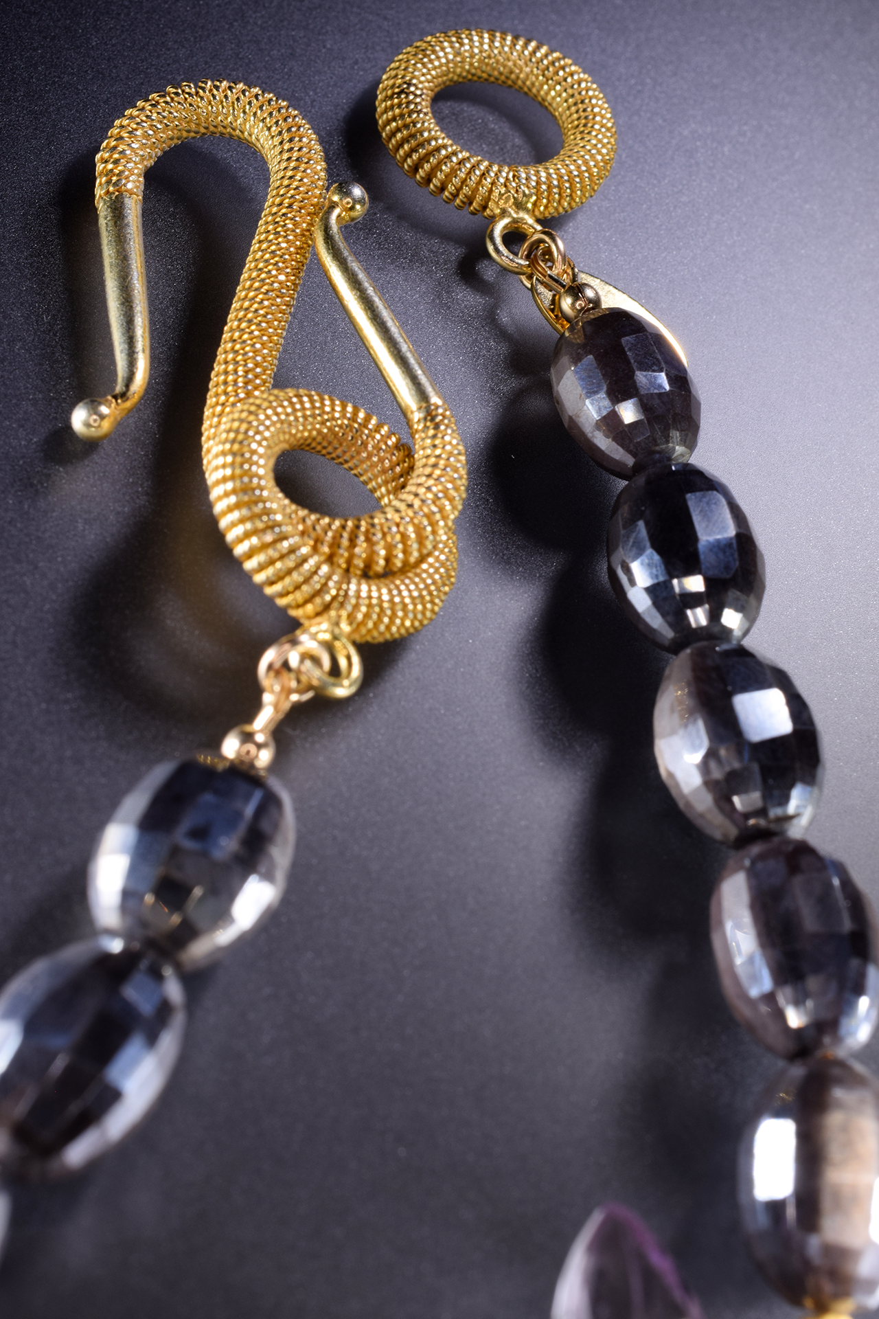 round faceted moonstone with side gemstone pearl gold accent