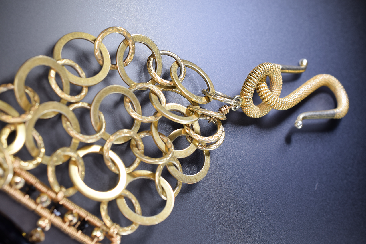 black spinel triple strand gold necklace