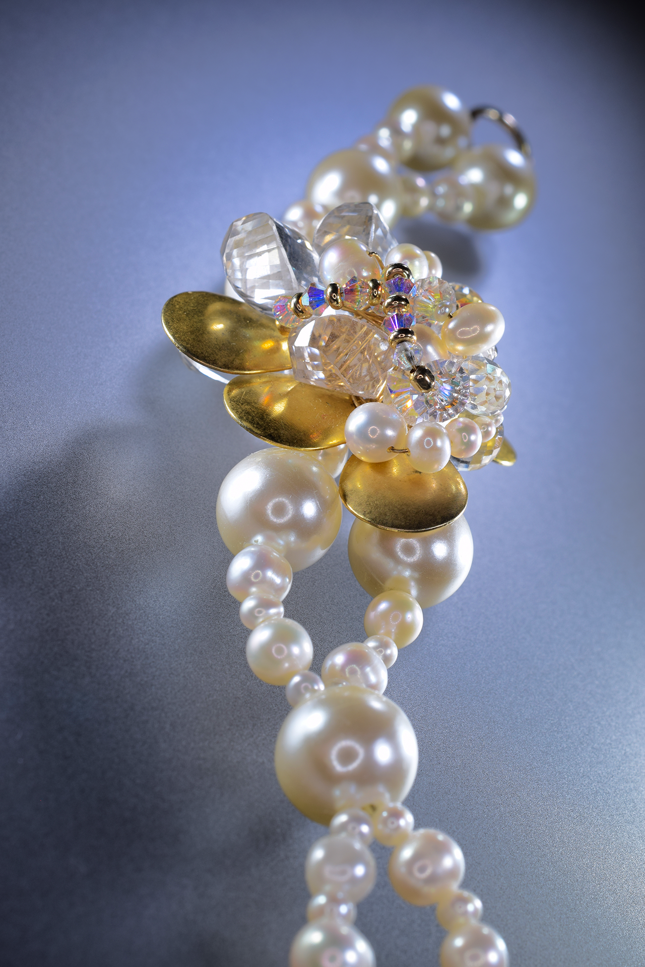 double pearl strand with Swarovski crystals and gold bracelet