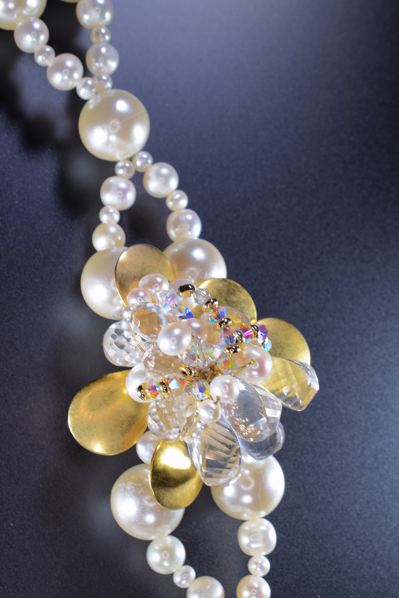 double pearl strand with Swarovski crystals and gold bracelet