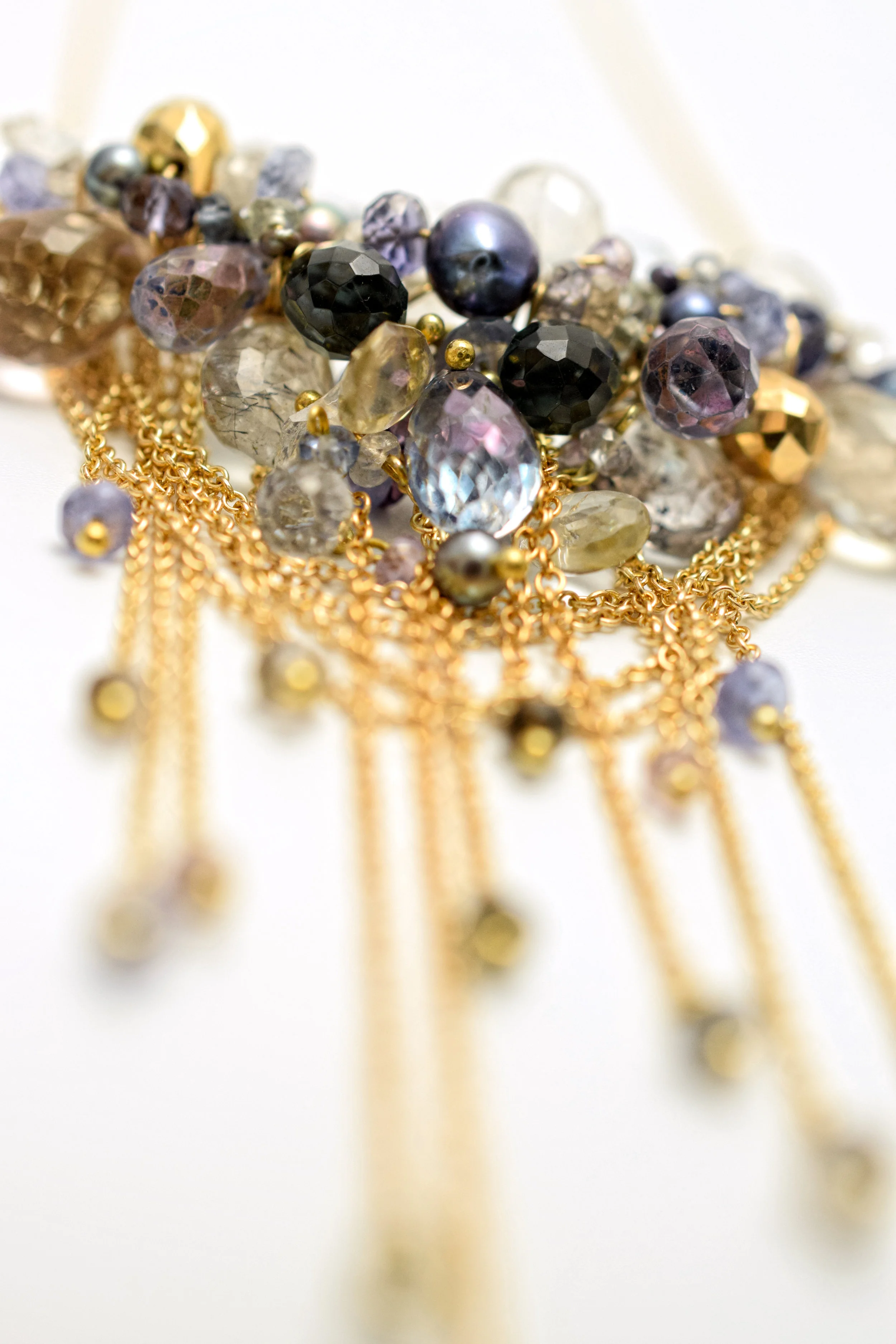 multi-drop gemstone necklace with delicate gold chains