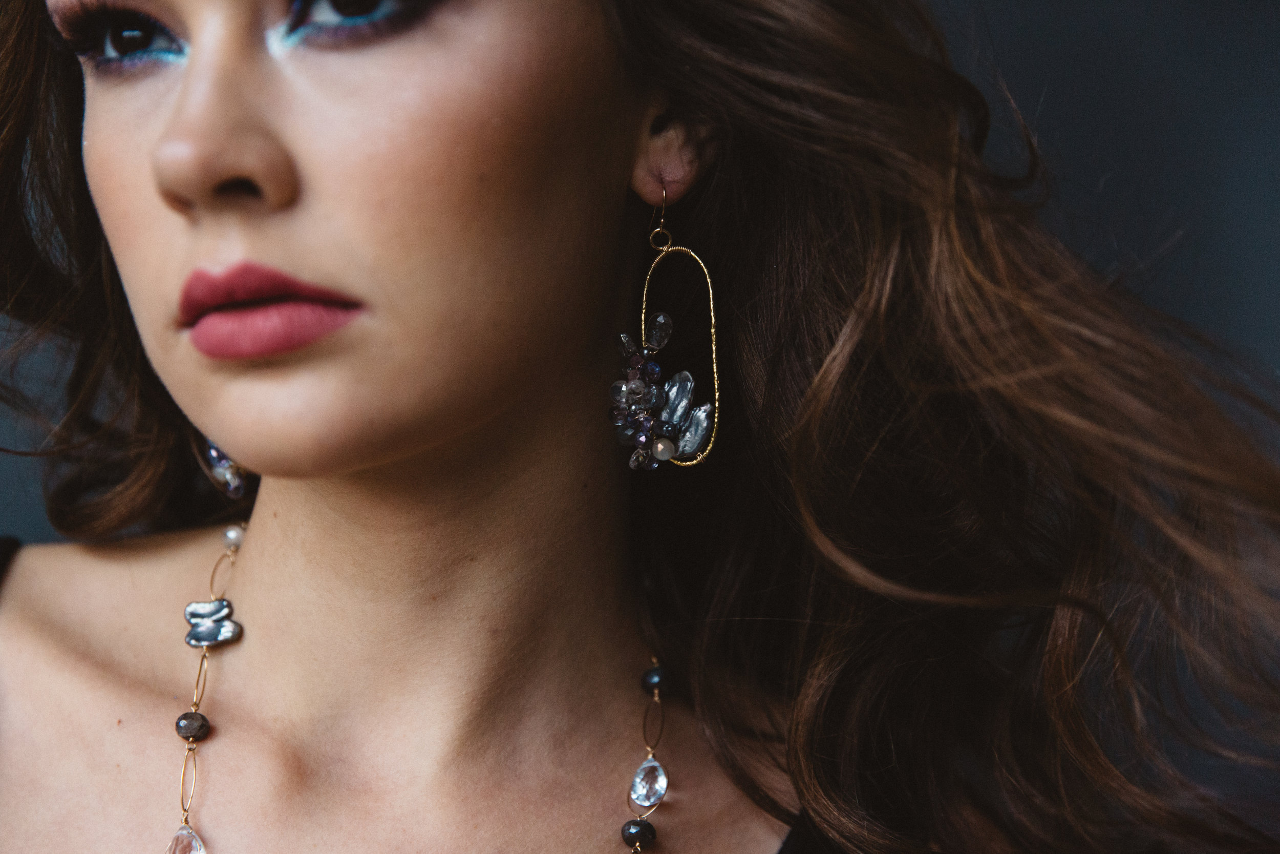 model wearing gemstone biwa pearl earrings