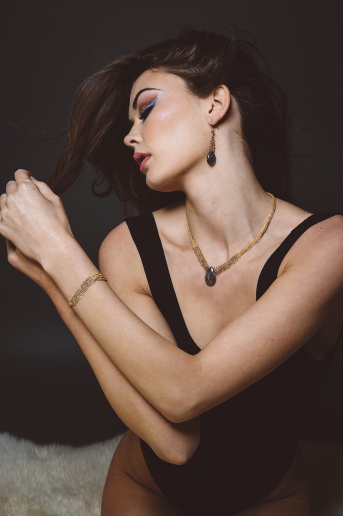 model wearing labradorite chain woven earrings