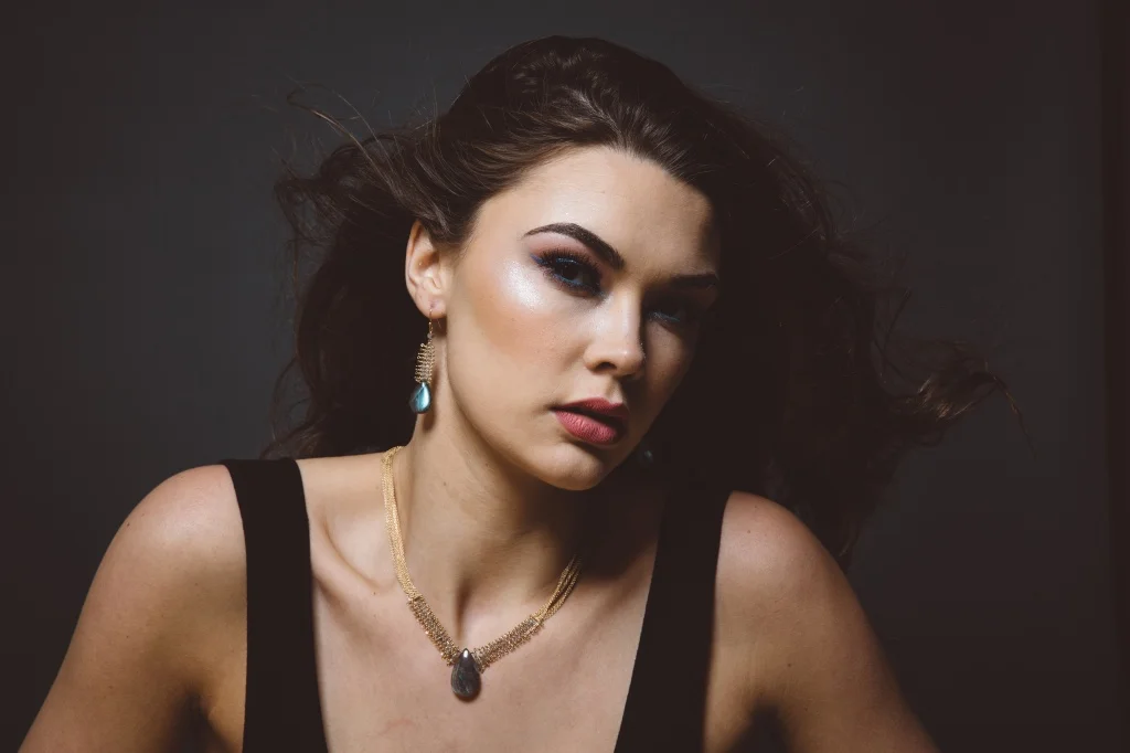 model wearing labradorite chain woven earrings