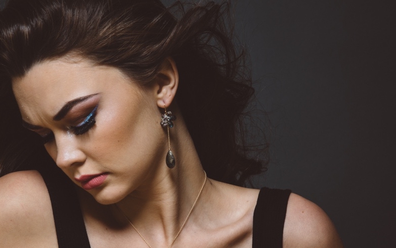 model wearing labradorite and gemstone earrings