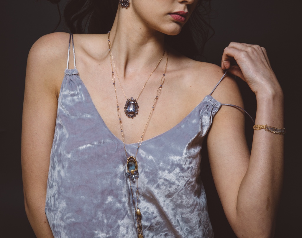 model wearing iolite pendant necklace