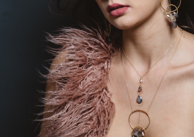 model wearing moonstone triple drop gold necklace